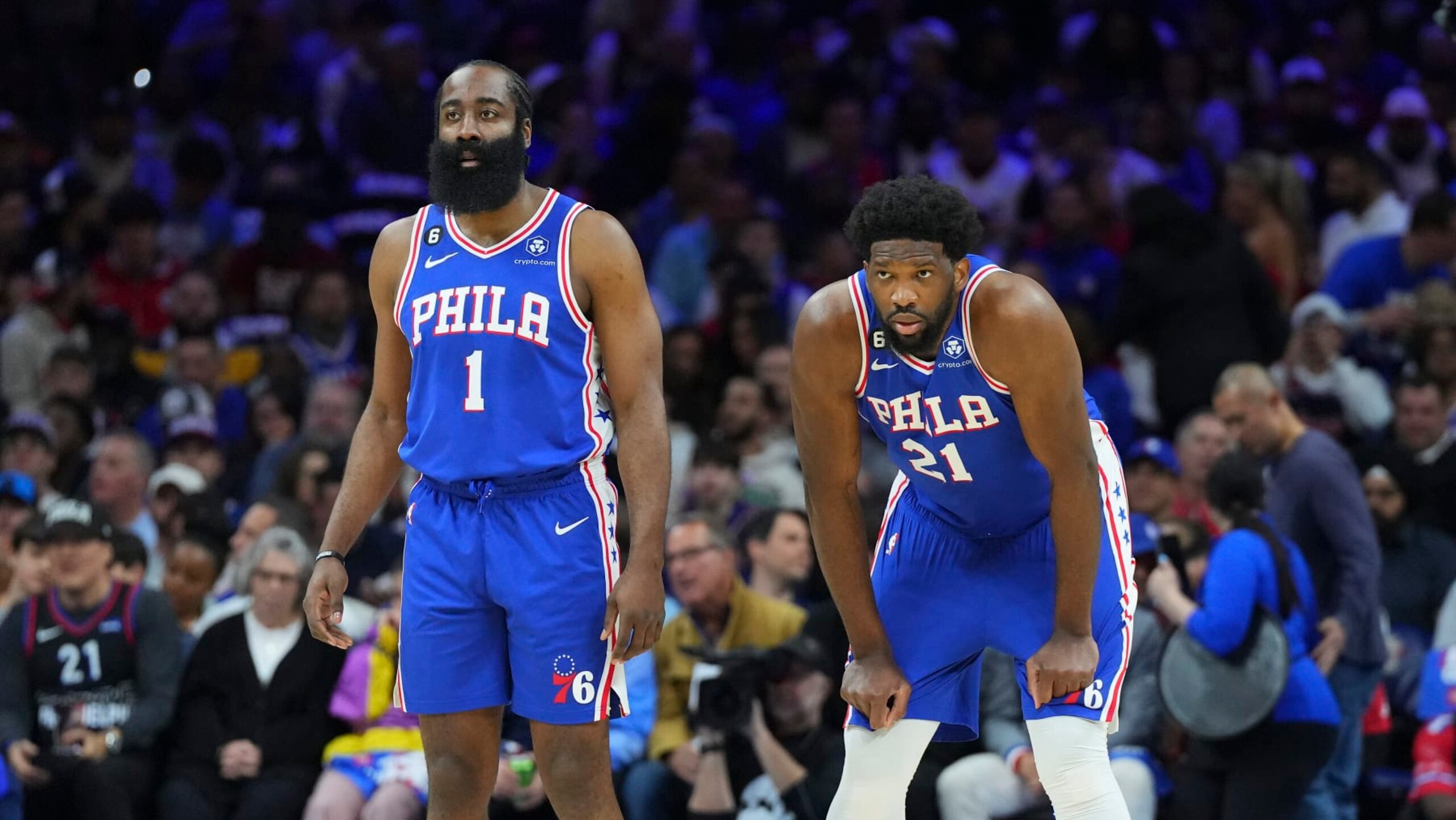 PHILADELPHIA, PA - APRIL 17: James Harden #1 and Joel Embiid #21 of the Philadelphia 76ers look on against the Brooklyn Nets during Game Two of the Eastern Conference First Round Playoffs at the Wells Fargo Center on April 17, 2023 in Philadelphia, Pennsylvania. NOTE TO USER: User expressly acknowledges and agrees that, by downloading and or using this photograph, User is consenting to the terms and conditions of the Getty Images License Agreement. (Photo by Mitchell Leff/Getty Images)