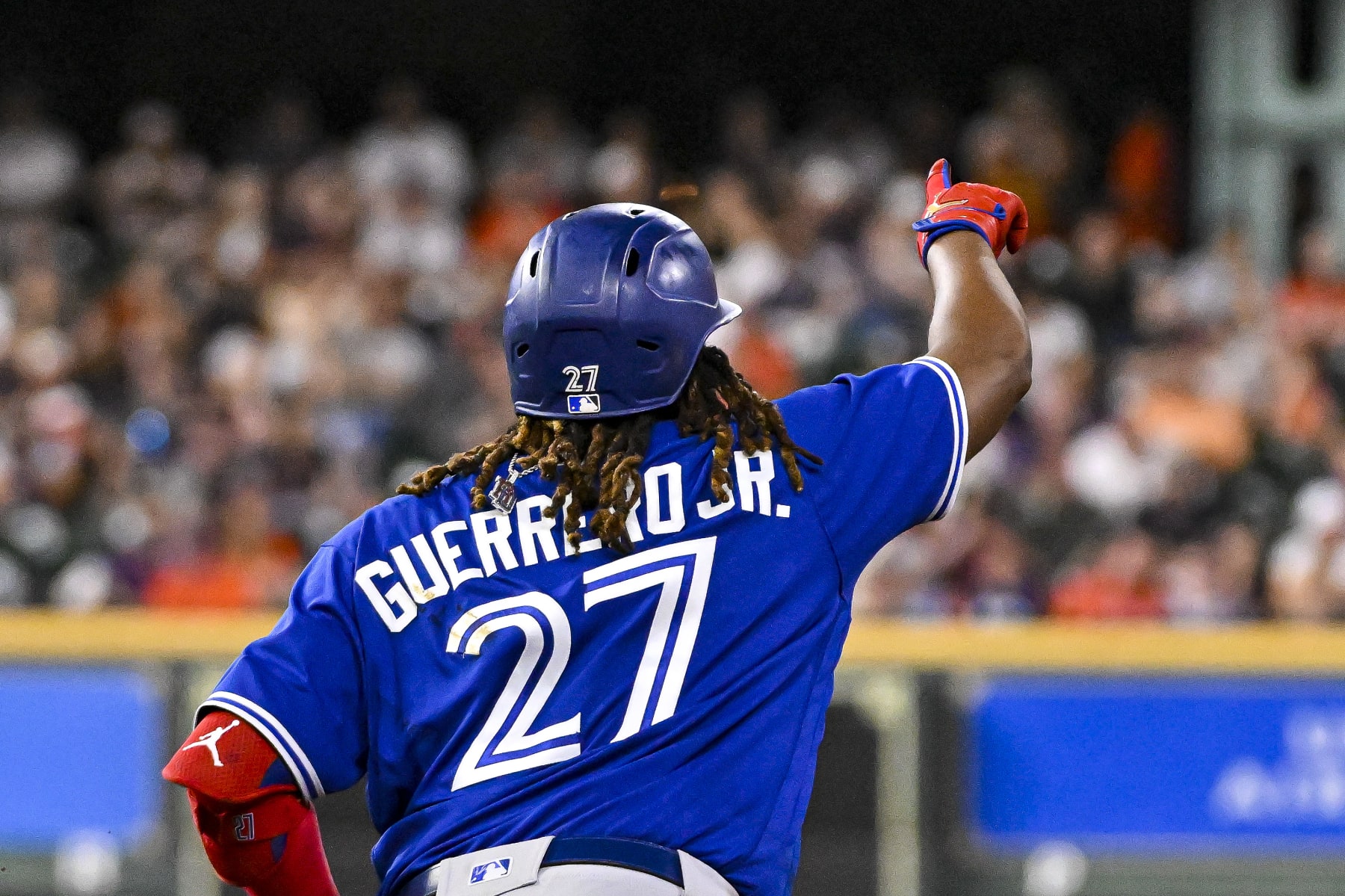 HOUSTON, TEXAS - APRIL 18: Vladimir Guerrero Jr. #27 of the Toronto Blue Jays gestures on a solo home run in the fourth inning against the Houston Astros at Minute Maid Park on April 18, 2023 in Houston, Texas. (Photo by Logan Riely/Getty Images)