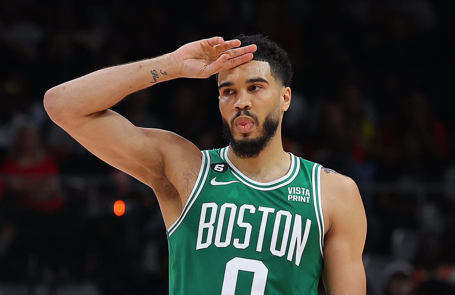 ATLANTA, GEORGIA - APRIL 21:  Jayson Tatum #0 of the Boston Celtics reacts after Trae Young #11 of the Atlanta Hawks collected his second foul during the second quarter of Game Three of the Eastern Conference First Round Playoffs at State Farm Arena on April 21, 2023 in Atlanta, Georgia.  NOTE TO USER: User expressly acknowledges and agrees that, by downloading and or using this photograph, User is consenting to the terms and conditions of the Getty Images License Agreement.  (Photo by Kevin C. Cox/Getty Images)