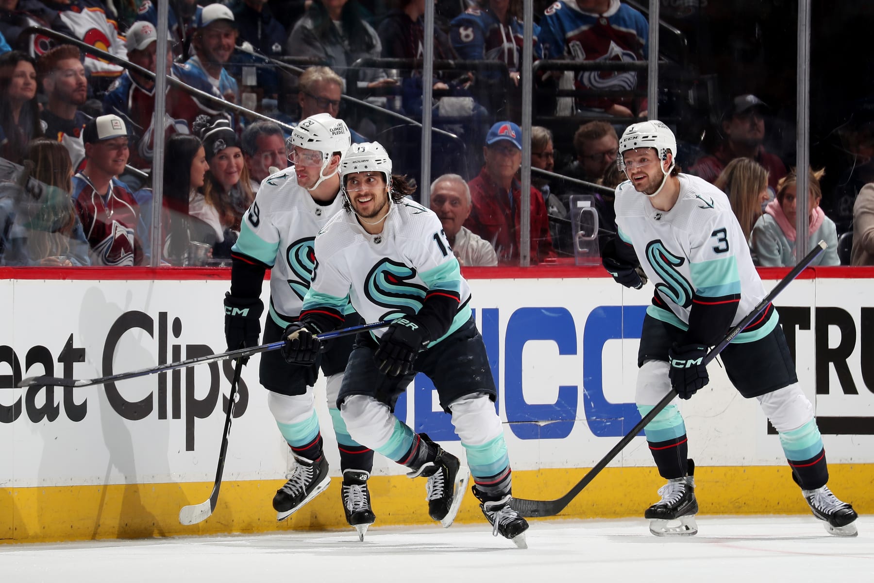 DENVER, COLORADO - APRIL 20: Vince Dunn #29, Brandon Tanev #13 and Will Borgen #3 of the Seattle Kraken celebrate a goal against the Colorado Avalanche in Game Two of the First Round of the Stanley Cup Playoffs at Ball Arena on April 20, 2023 in Denver, Colorado. (Photo by Michael Martin/NHLI via Getty Images)