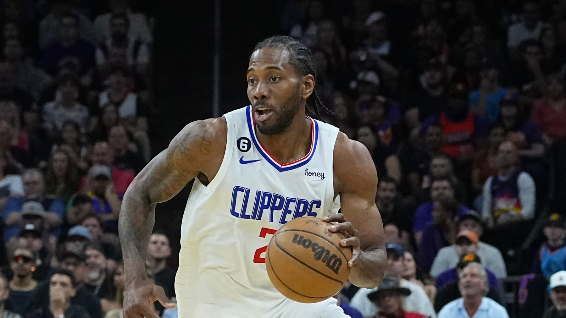 Los Angeles Clippers forward Kawhi Leonard drives against the Phoenix Suns during the second half of Game 2 of a first-round NBA basketball playoff series, Tuesday, April 18, 2023, in Phoenix. (AP Photo/Matt York)