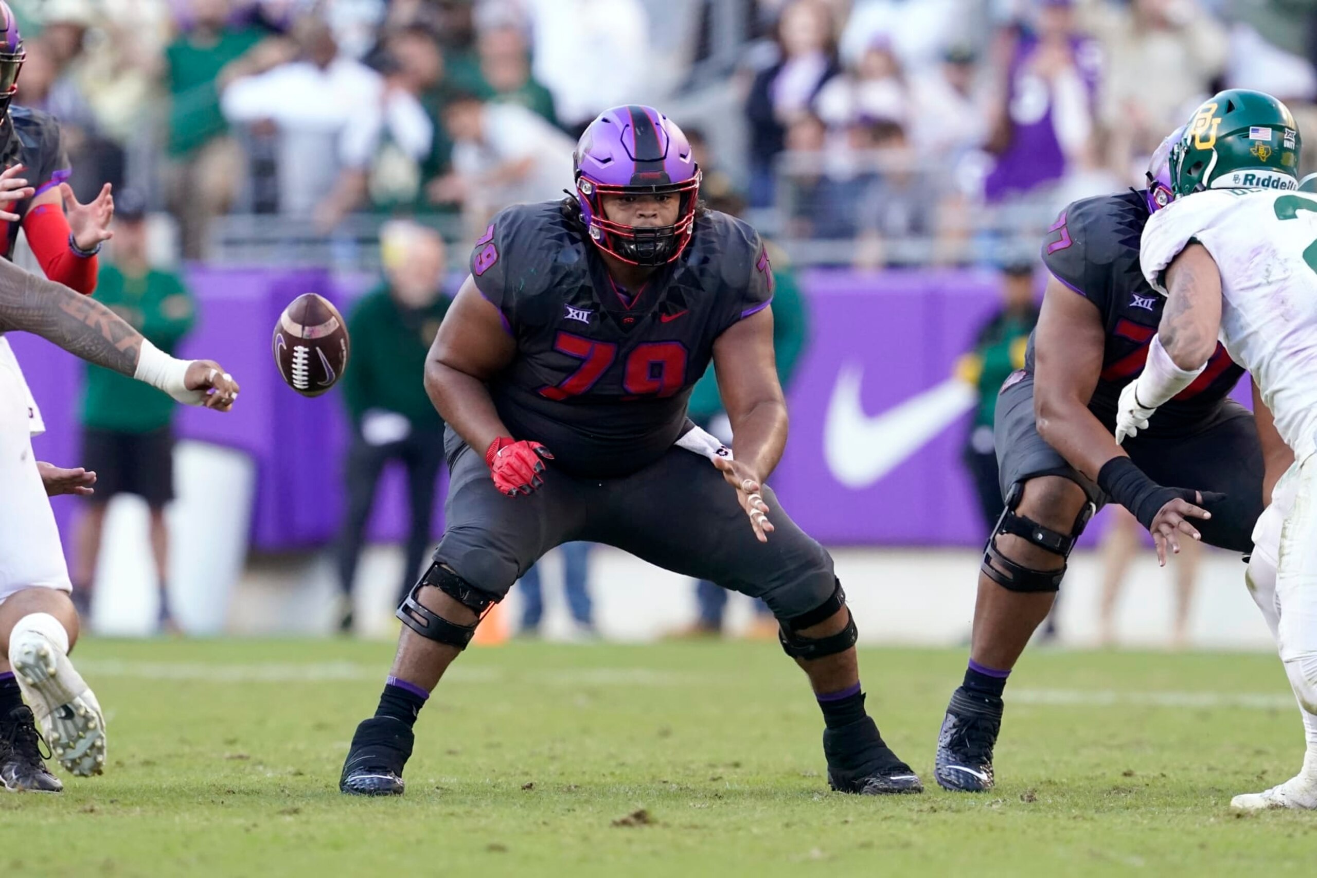 TCU center Steve Avila (79) defends against a rush by Baylor during an NCAA college football game in Fort Worth, Texas, Saturday, Nov. 6, 2021. (AP Photo/Tony Gutierrez)