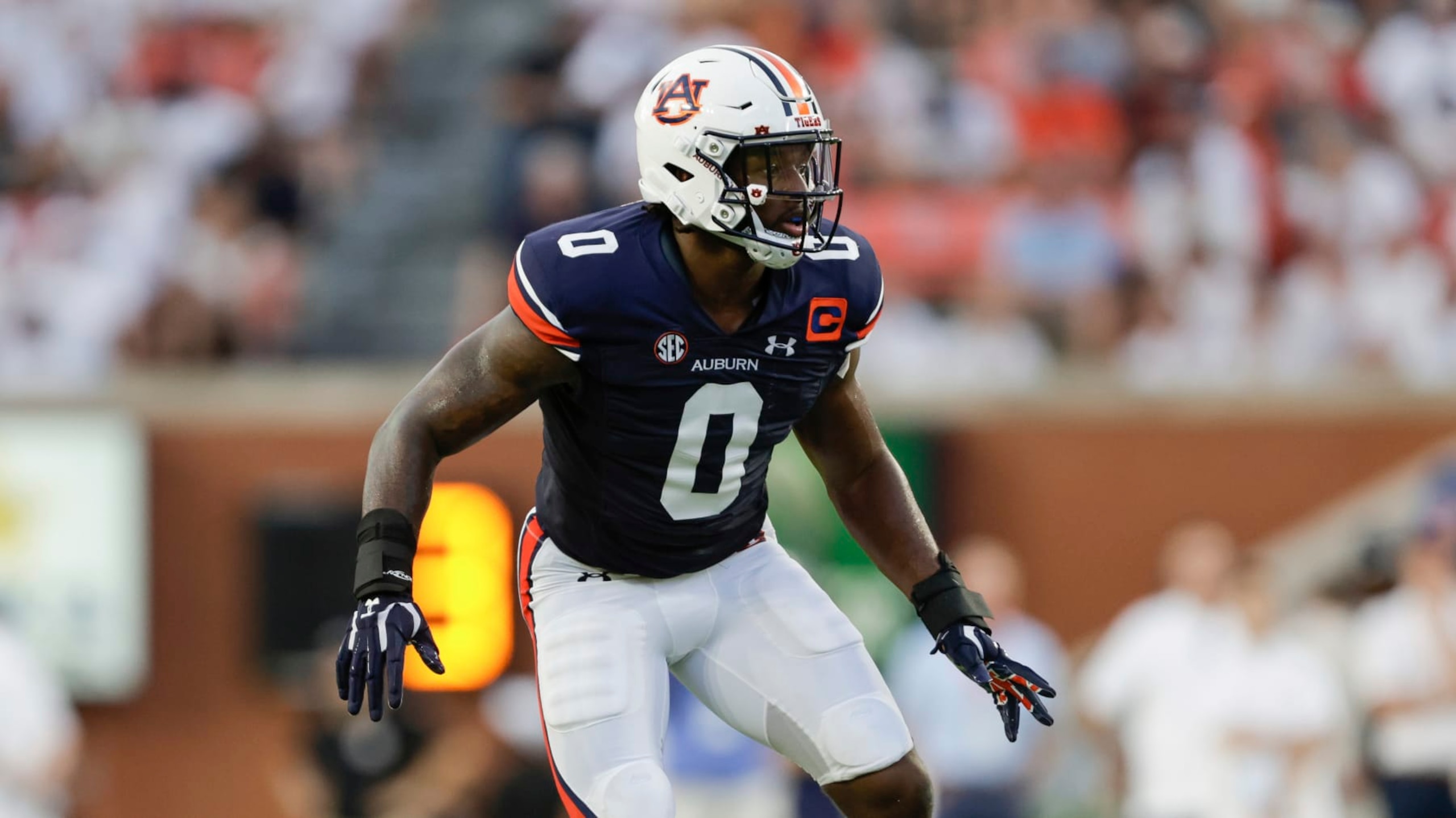 Auburn's Owen Pappoe (0) defends during the first half of an NCAA football game against Mercer on Saturday, Sept. 3, 2022, in Auburn, Ala. (AP Photo/Stew Milne)