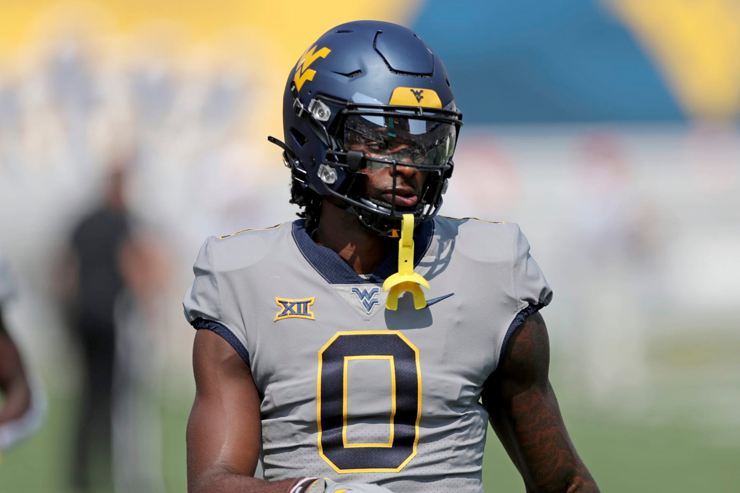 West Virginia's Bryce Ford-Wheaton #0 is seen before an NCAA football game on Saturday, Sept. 17, 2022, in Morgantown, W. Va. (AP Photo/Gregory Payan)