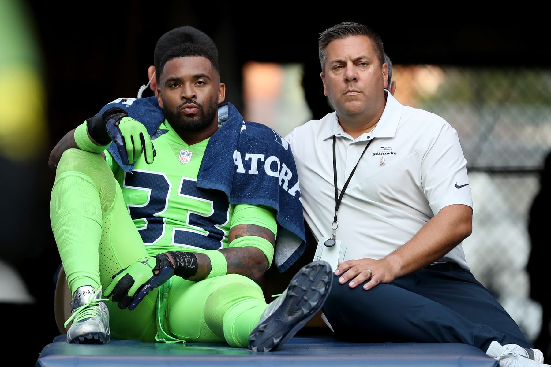 SEATTLE, WASHINGTON - SEPTEMBER 12: Jamal Adams #33 of the Seattle Seahawks is carted off the field with an injury during the second quarter against the Denver Broncos at Lumen Field on September 12, 2022 in Seattle, Washington. (Photo by Steph Chambers/Getty Images)