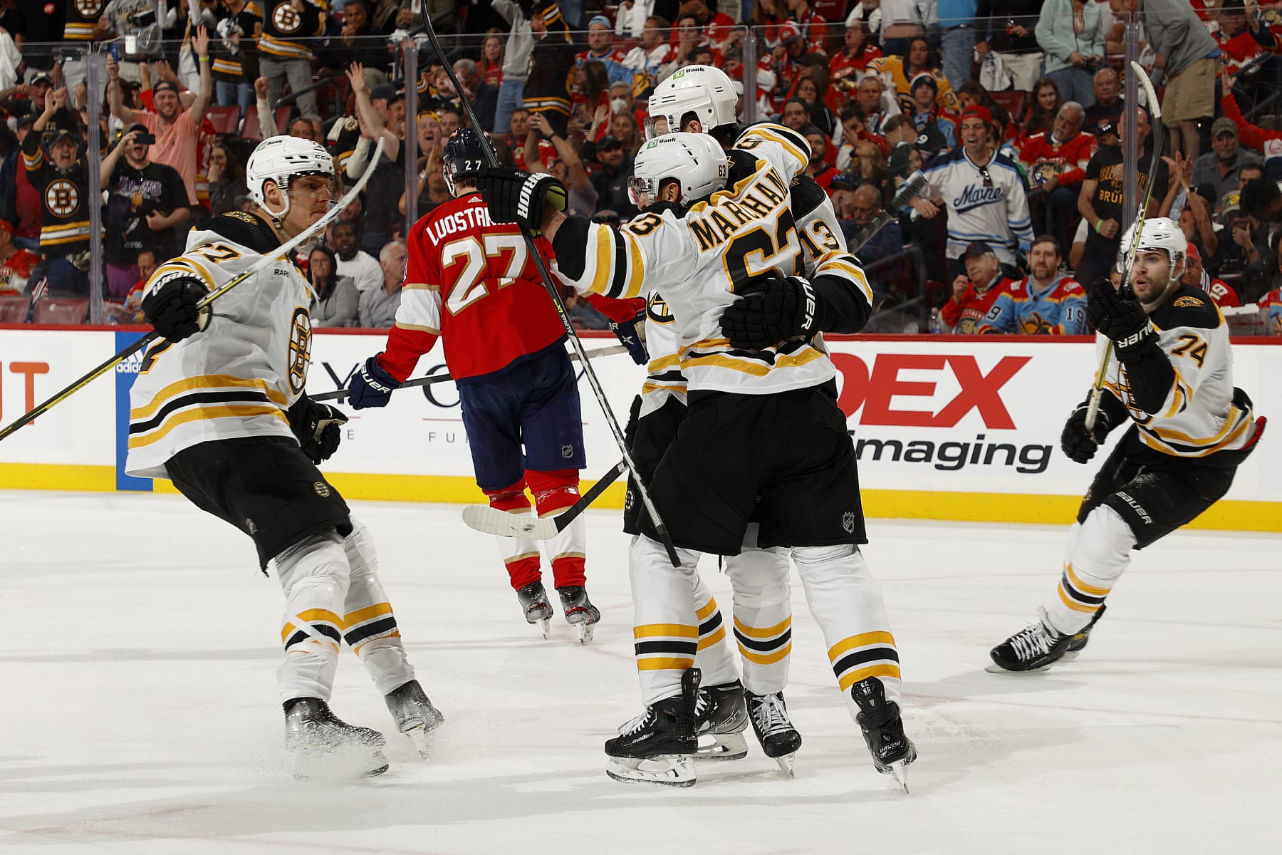 SUNRISE, FLORIDA - APRIL 21: Charlie Coyle #13 of the Boston Bruins celebrates his goal with teammates during the second period against the Florida Panthers in Game Three of the First Round of the 2023 Stanley Cup Playoffs at the FLA Live Arena on April 21, 2023 in Sunrise, Florida. (Photo by Eliot J. Schechter/NHLI via Getty Images)