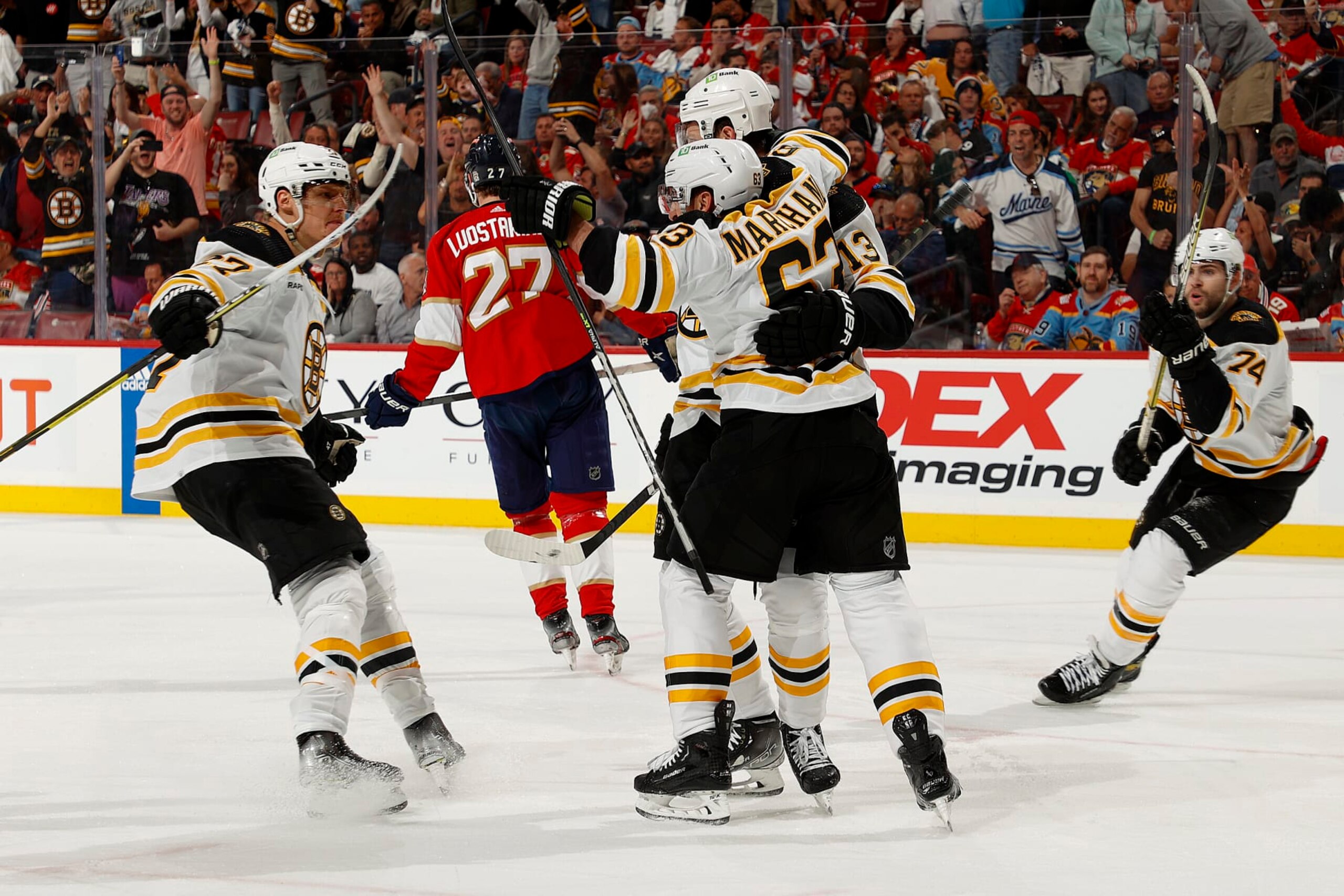 SUNRISE, FLORIDA - APRIL 21: Charlie Coyle #13 of the Boston Bruins celebrates his goal with teammates during the second period against the Florida Panthers in Game Three of the First Round of the 2023 Stanley Cup Playoffs at the FLA Live Arena on April 21, 2023 in Sunrise, Florida. (Photo by Eliot J. Schechter/NHLI via Getty Images)