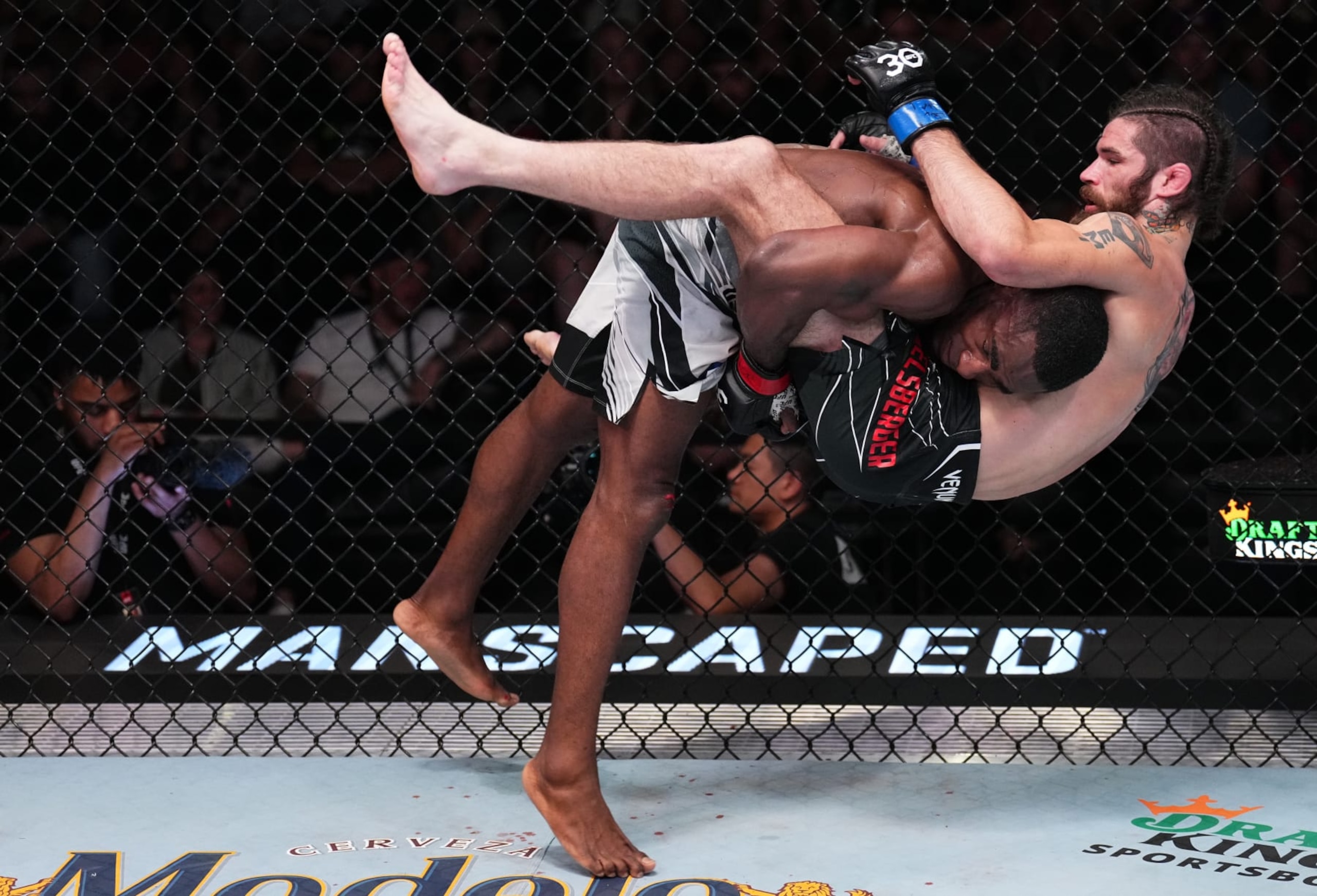 LAS VEGAS, NEVADA - APRIL 22: (L-R) Jeremiah Wells takes down Matthew Semelsberger in a welterweight fight during the UFC Fight Night event at UFC APEX on April 22, 2023 in Las Vegas, Nevada. (Photo by Chris Unger/Zuffa LLC via Getty Images)
