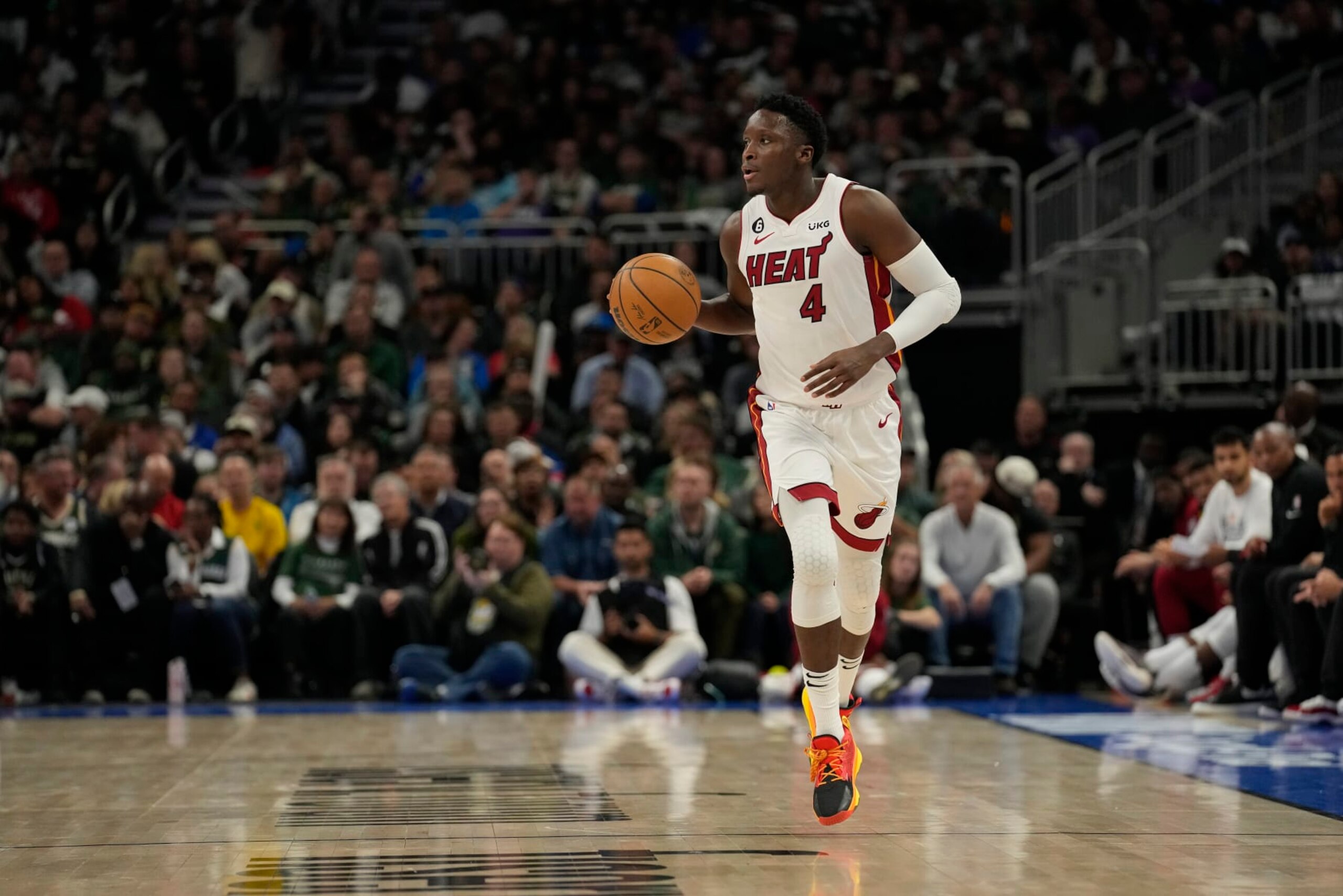 MILWAUKEE, WISCONSIN - APRIL 19: Victor Oladipo #4 of the Miami Heat dribbles the ball against the Milwaukee Bucks during the second half of Game Two of the Eastern Conference First Round Playoffs at Fiserv Forum on April 19, 2023 in Milwaukee, Wisconsin. NOTE TO USER: User expressly acknowledges and agrees that, by downloading and or using this photograph, user is consenting to the terms and conditions of the Getty Images License Agreement. (Photo by Patrick McDermott/Getty Images)