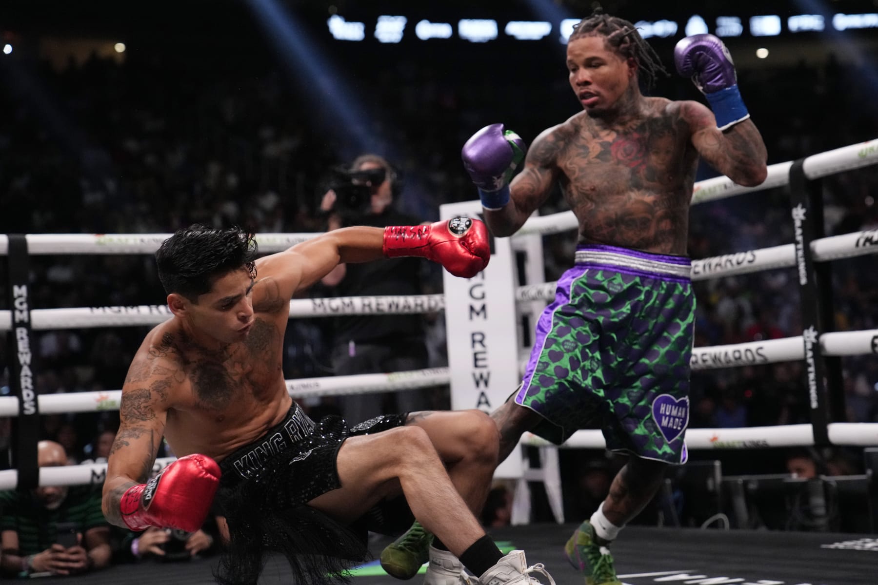 Gervonta Davis knocks down Ryan Garcia in a lightweight boxing bout Saturday, April 22, 2023, in Las Vegas. (AP Photo/John Locher)