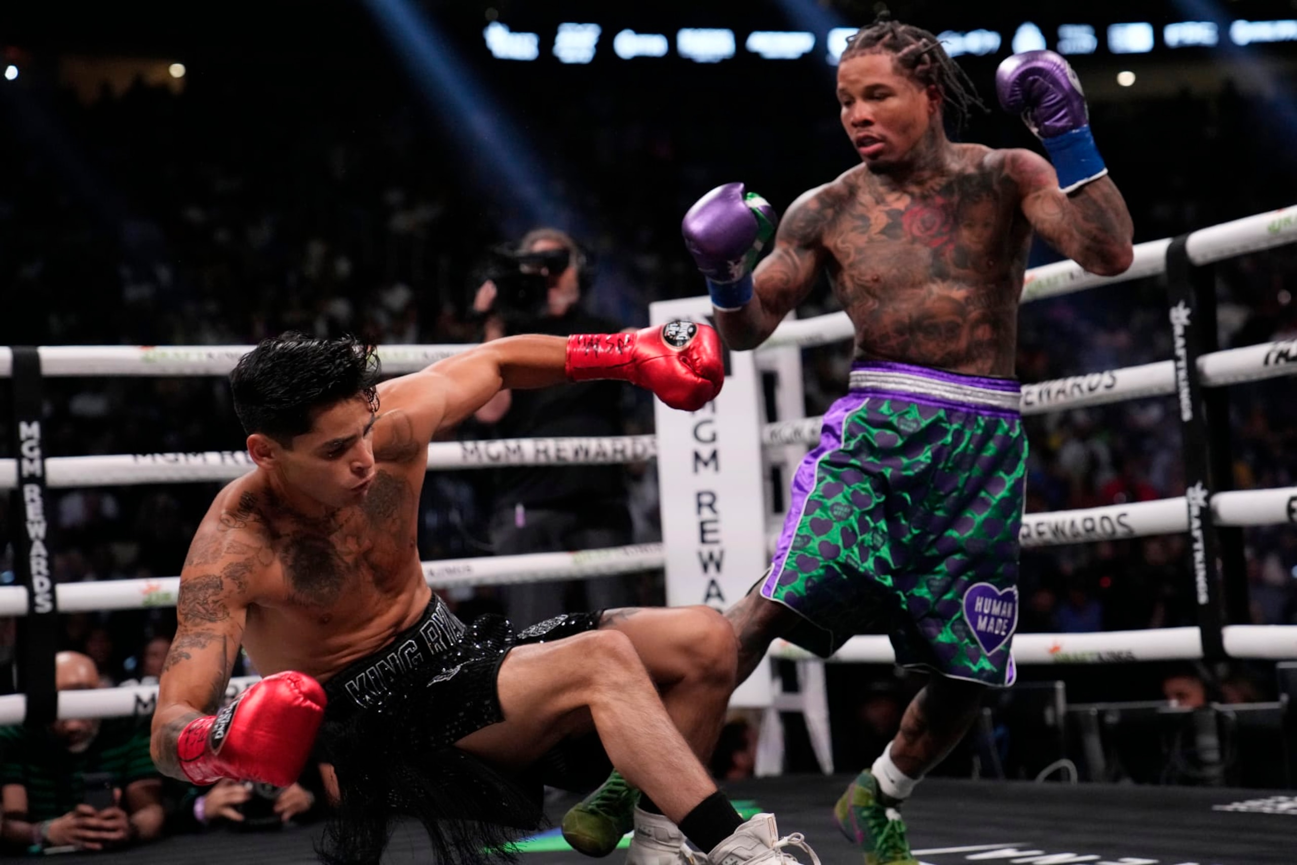 Gervonta Davis knocks down Ryan Garcia in a lightweight boxing bout Saturday, April 22, 2023, in Las Vegas. (AP Photo/John Locher) Gervonta Davis knocks down Ryan Garcia in a lightweight boxing bout Saturday, April 22, 2023, in Las Vegas. (AP Photo/John Locher)
