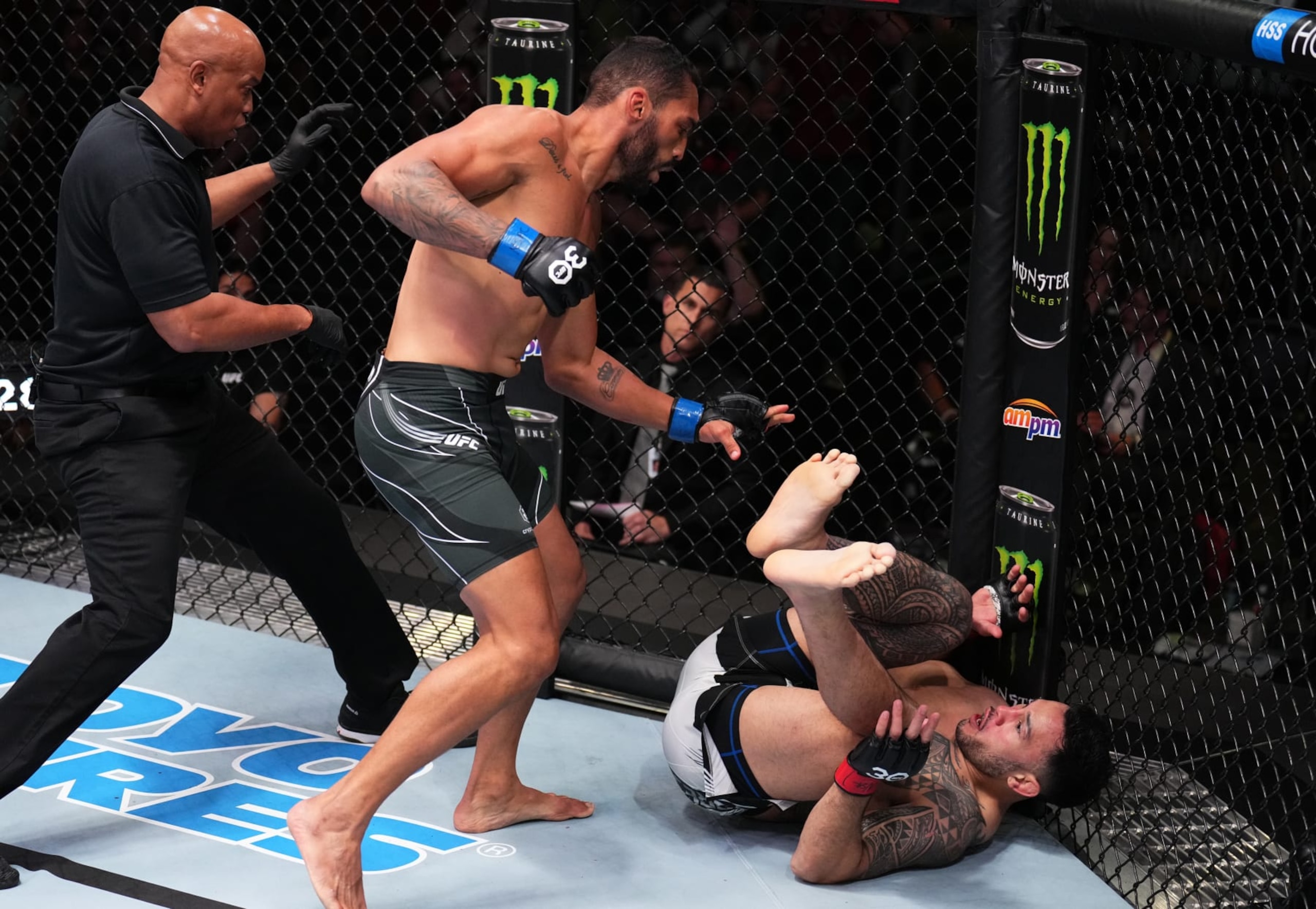 LAS VEGAS, NEVADA - APRIL 22: (L-R) Bruno Silva of Brazil punches Brad Tavares in a middleweight fight during the UFC Fight Night event at UFC APEX on April 22, 2023 in Las Vegas, Nevada. (Photo by Chris Unger/Zuffa LLC via Getty Images)