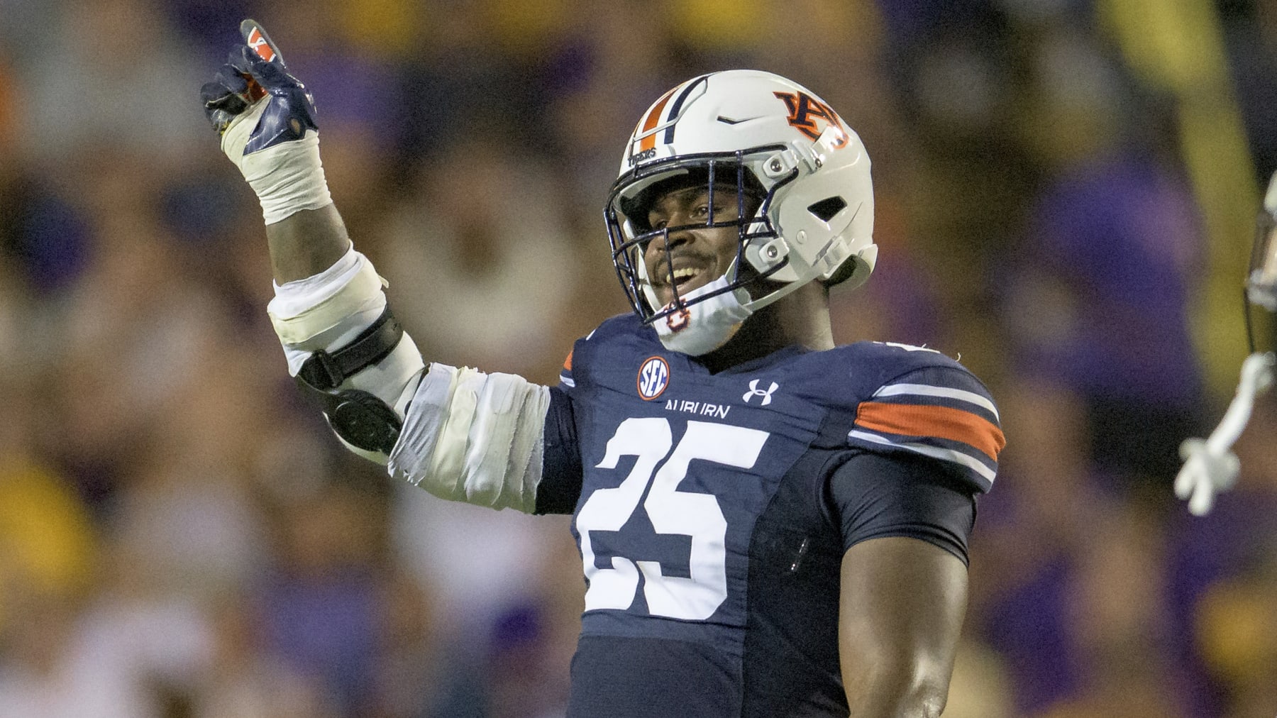 Auburn defensive end Colby Wooden (25) reacts during an NCAA football game against LSU on Saturday, Oct. 2, 2021, in Baton Rouge, La. (AP Photo/Matthew Hinton)