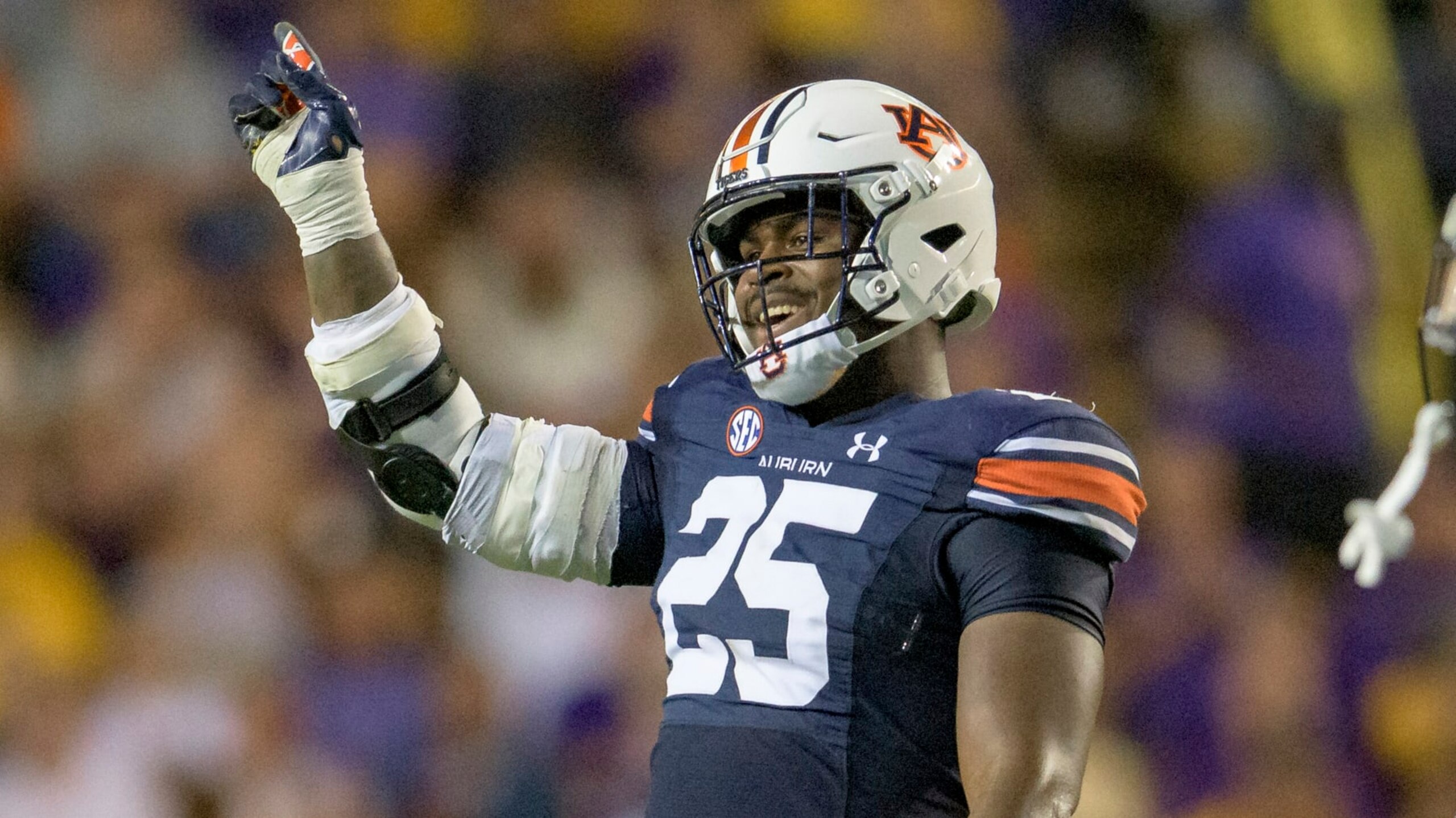 Auburn defensive end Colby Wooden (25) reacts during an NCAA football game against LSU on Saturday, Oct. 2, 2021, in Baton Rouge, La. (AP Photo/Matthew Hinton) Auburn defensive end Colby Wooden (25) reacts during an NCAA football game against LSU on Saturday, Oct. 2, 2021, in Baton Rouge, La. (AP Photo/Matthew Hinton)