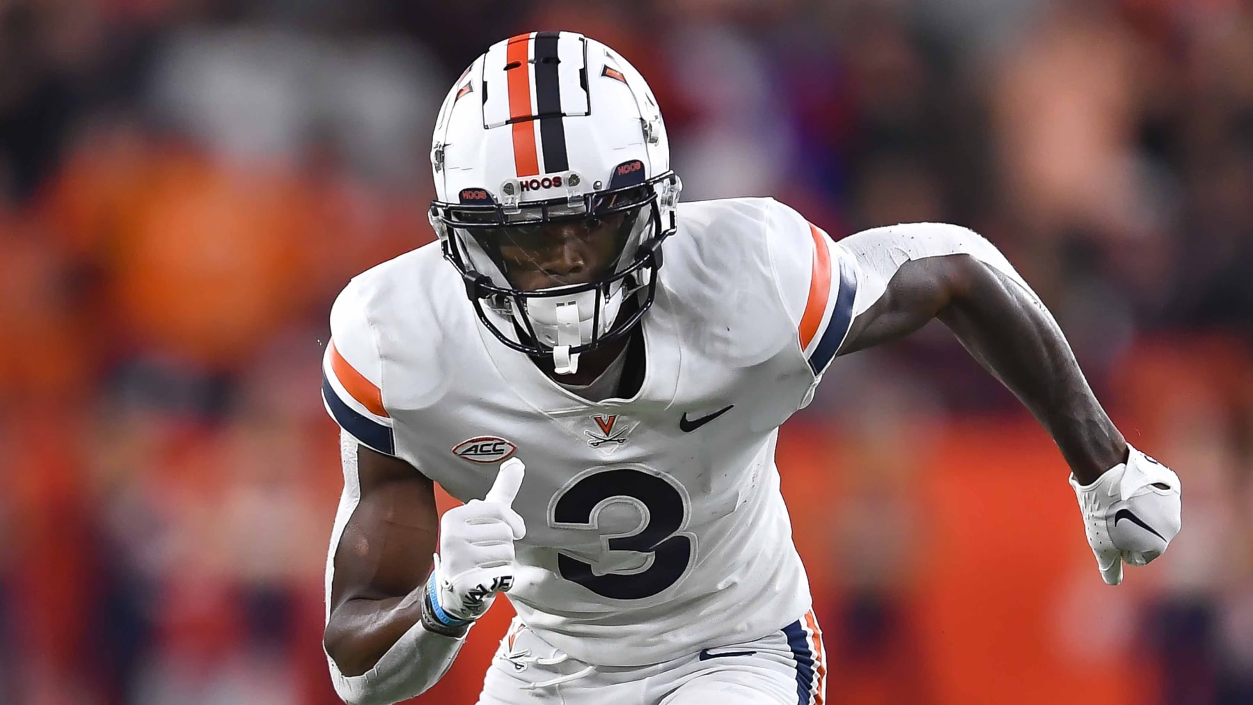 Virginia wide receiver Dontayvion Wicks (3) runs on the field during the first half of an NCAA college football game against Syracuse on Friday, Sept. 23, 2022 in Syracuse, N.Y. (AP Photo/Adrian Kraus)