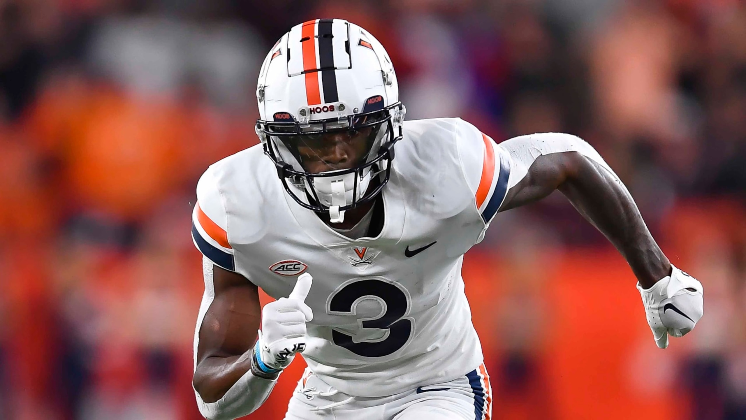 Virginia wide receiver Dontayvion Wicks (3) runs on the field during the first half of an NCAA college football game against Syracuse on Friday, Sept. 23, 2022 in Syracuse, N.Y. (AP Photo/Adrian Kraus)