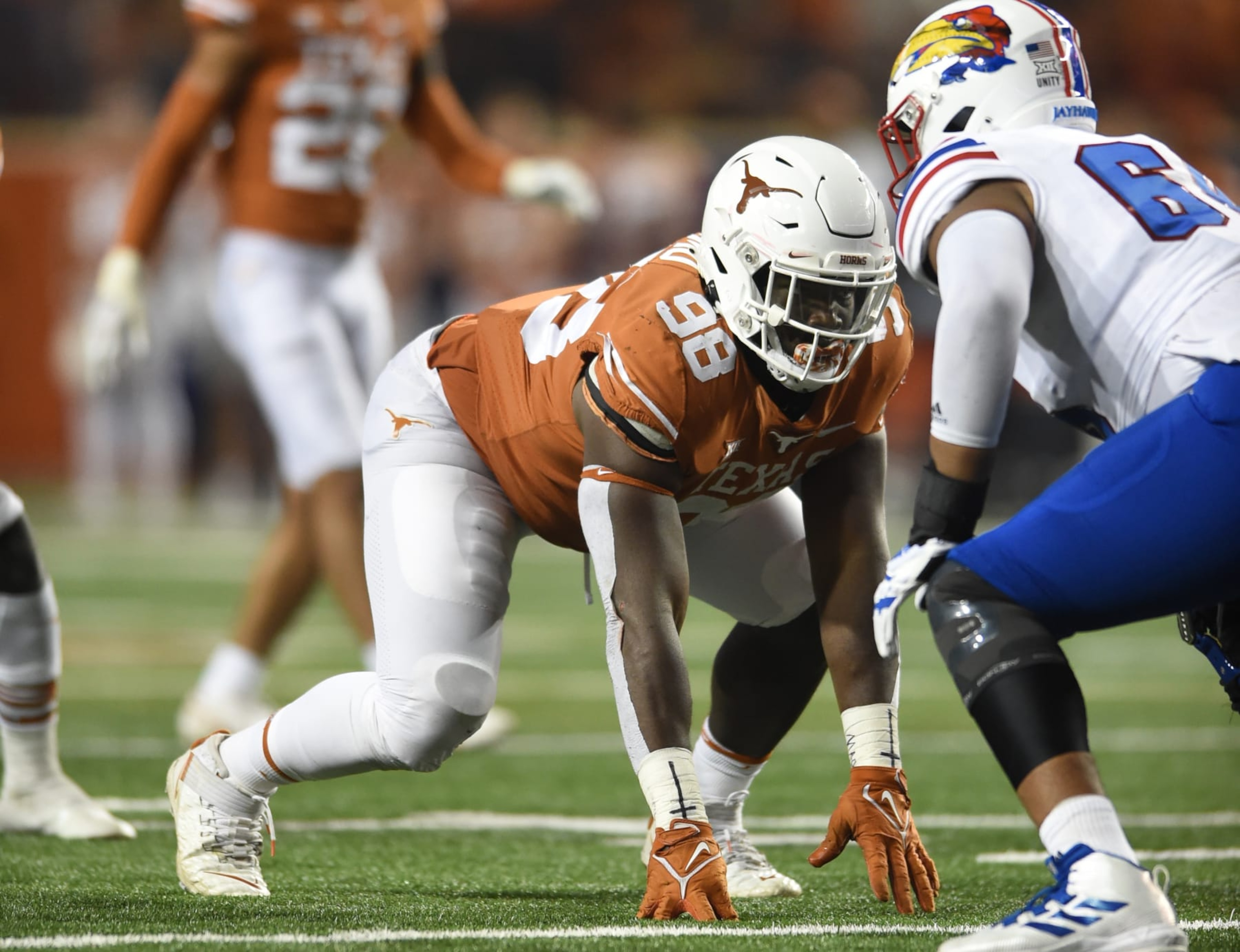 AUSTIN, TX - NOVEMBER 13: Texas Longhorns DT Moro Ojomo awaits a play during game between the Kansas Jayhawks and the Texas Longhorns on November 13, 2021 at Darrell K Royal-Texas Memorial Stadium in Austin, TX.  (Photo by John Rivera/Icon Sportswire via Getty Images)