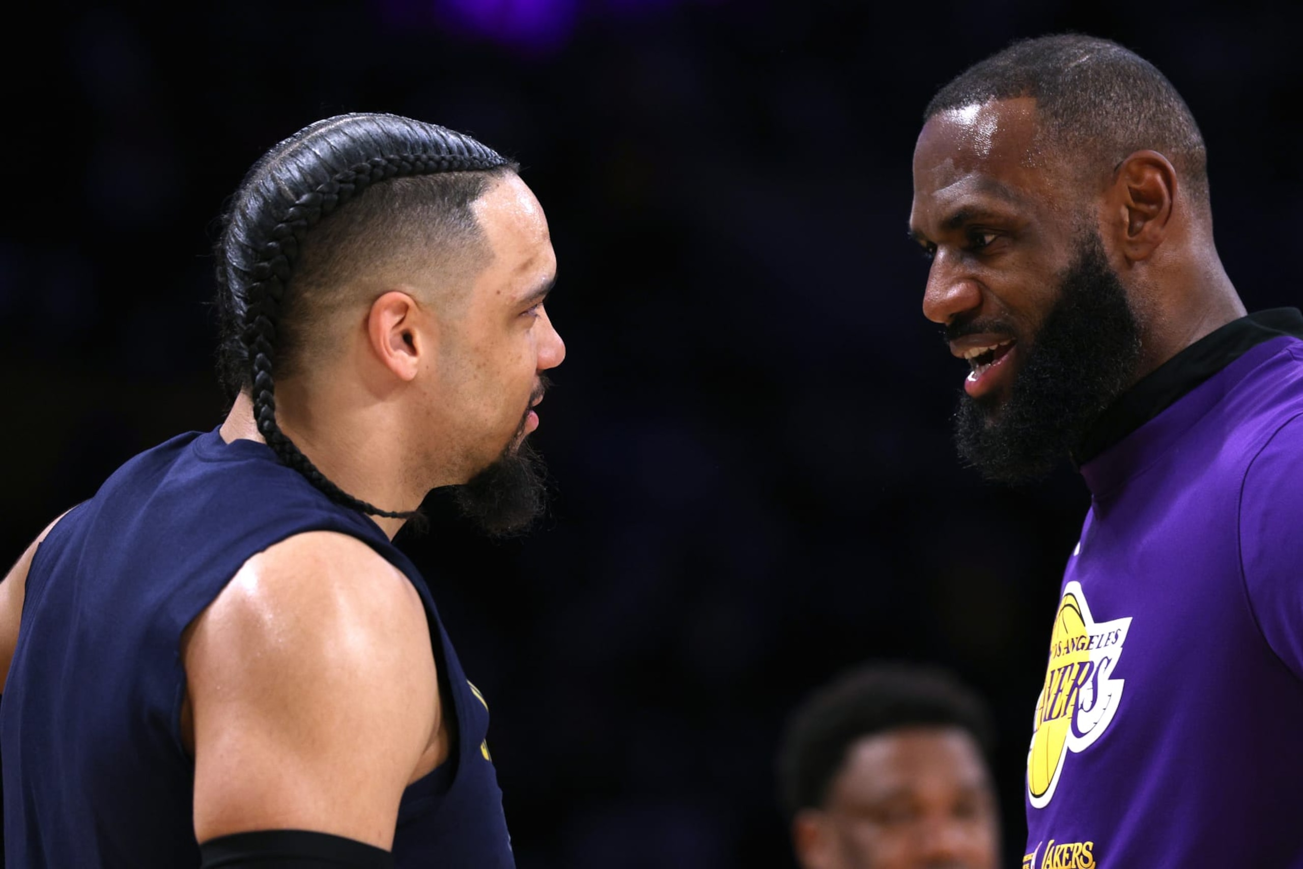 LOS ANGELES, CALIFORNIA - APRIL 22: LeBron James #6 of the Los Angeles Lakers talks with Dillon Brooks #24 of the Memphis Grizzlies before Game Three of the Western Conference First Round Playoffs at Crypto.com Arena on April 22, 2023 in Los Angeles, California. NOTE TO USER: User expressly acknowledges and agrees that, by downloading and or using this photograph, User is consenting to the terms and conditions of the Getty Images License Agreement. (Photo by Harry How/Getty Images)
