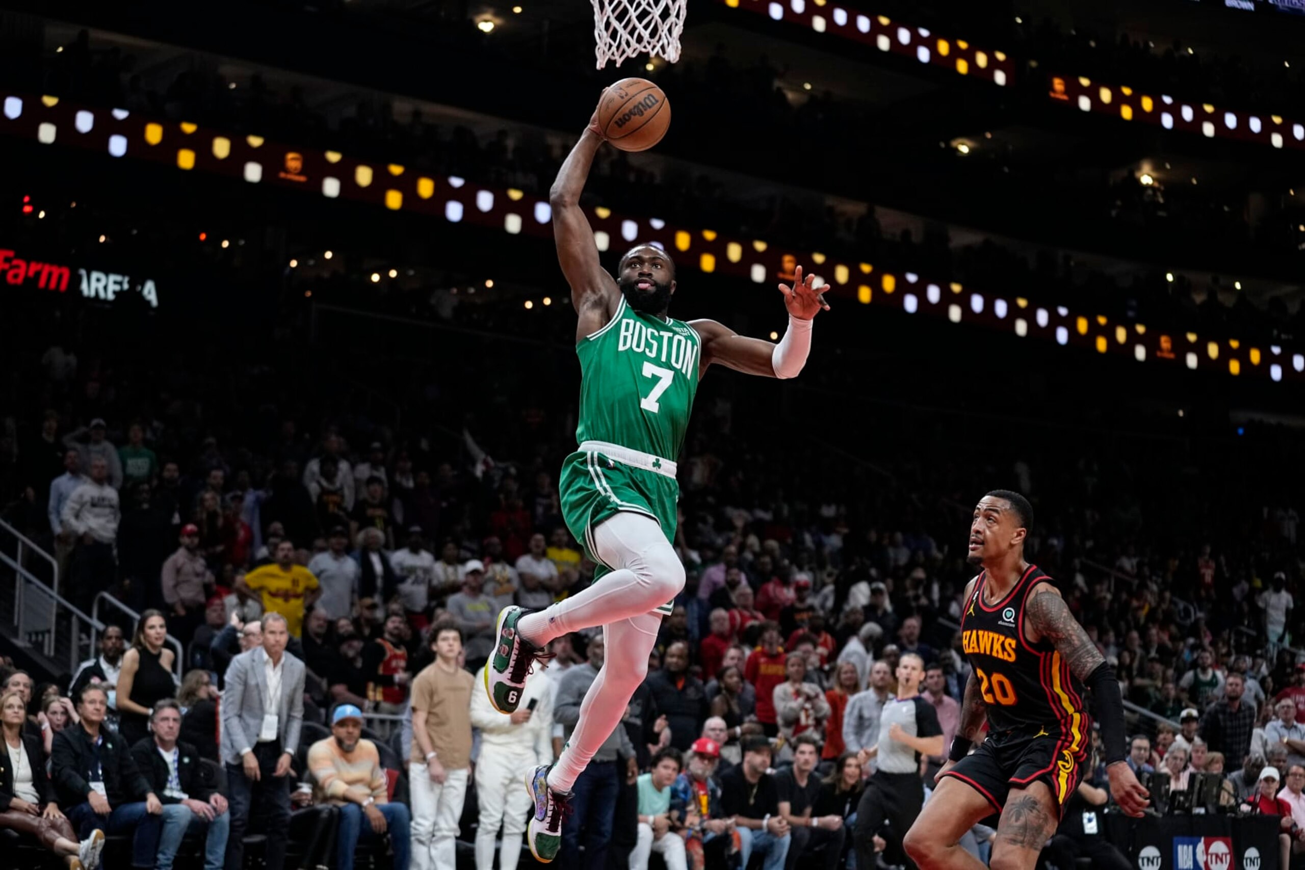 Boston Celtics guard Jaylen Brown (7) shoots and scores against the Atlanta Hawks during the first half of Game 4 of a first-round NBA basketball playoff series, Sunday, April 23, 2023, in Atlanta. (AP Photo/Brynn Anderson) Boston Celtics guard Jaylen Brown (7) shoots and scores against the Atlanta Hawks during the first half of Game 4 of a first-round NBA basketball playoff series, Sunday, April 23, 2023, in Atlanta. (AP Photo/Brynn Anderson)