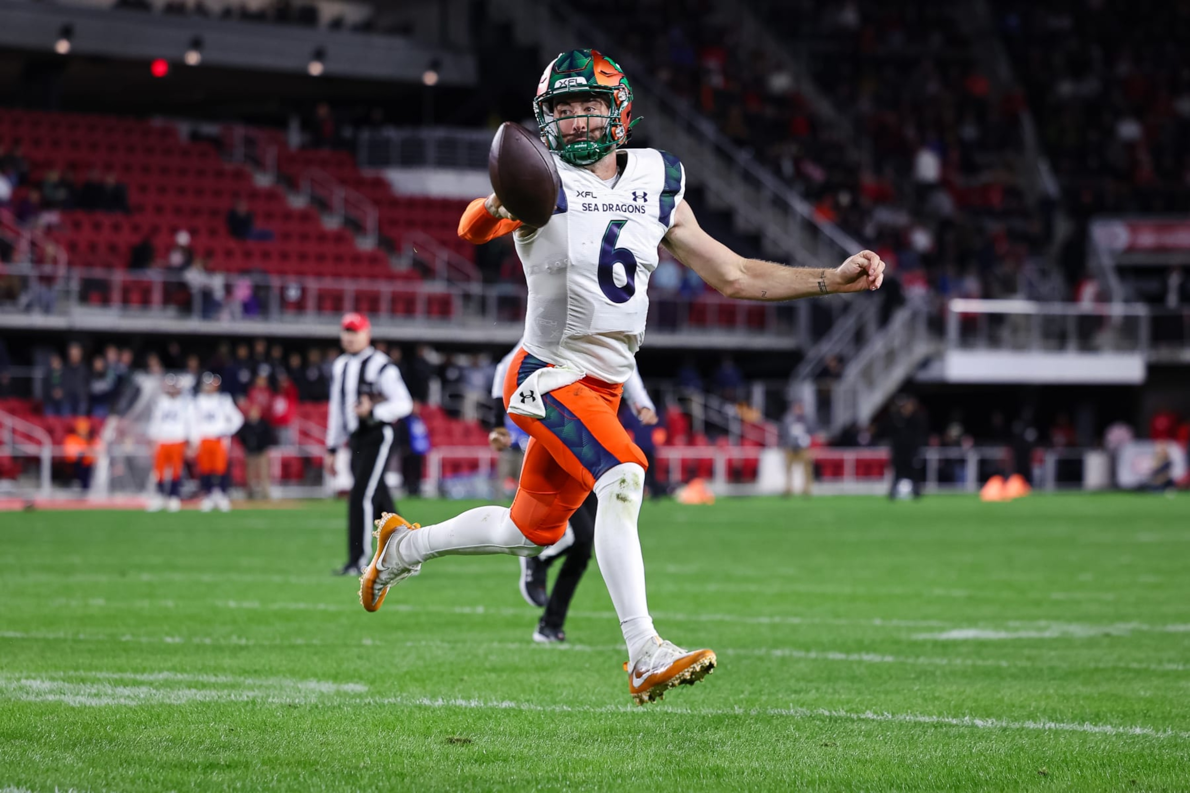 WASHINGTON, DC - FEBRUARY 19: Ben DiNucci #6 of the Seattle Sea Dragons flips a pass for a touchdown to Josh Gordon #0 during the first half of the XFL game against the DC Defenders at Audi Field on February 19, 2023 in Washington, DC. (Photo by Scott Taetsch/Getty Images) WASHINGTON, DC - FEBRUARY 19: Ben DiNucci #6 of the Seattle Sea Dragons flips a pass for a touchdown to Josh Gordon #0 during the first half of the XFL game against the DC Defenders at Audi Field on February 19, 2023 in Washington, DC. (Photo by Scott Taetsch/Getty Images)