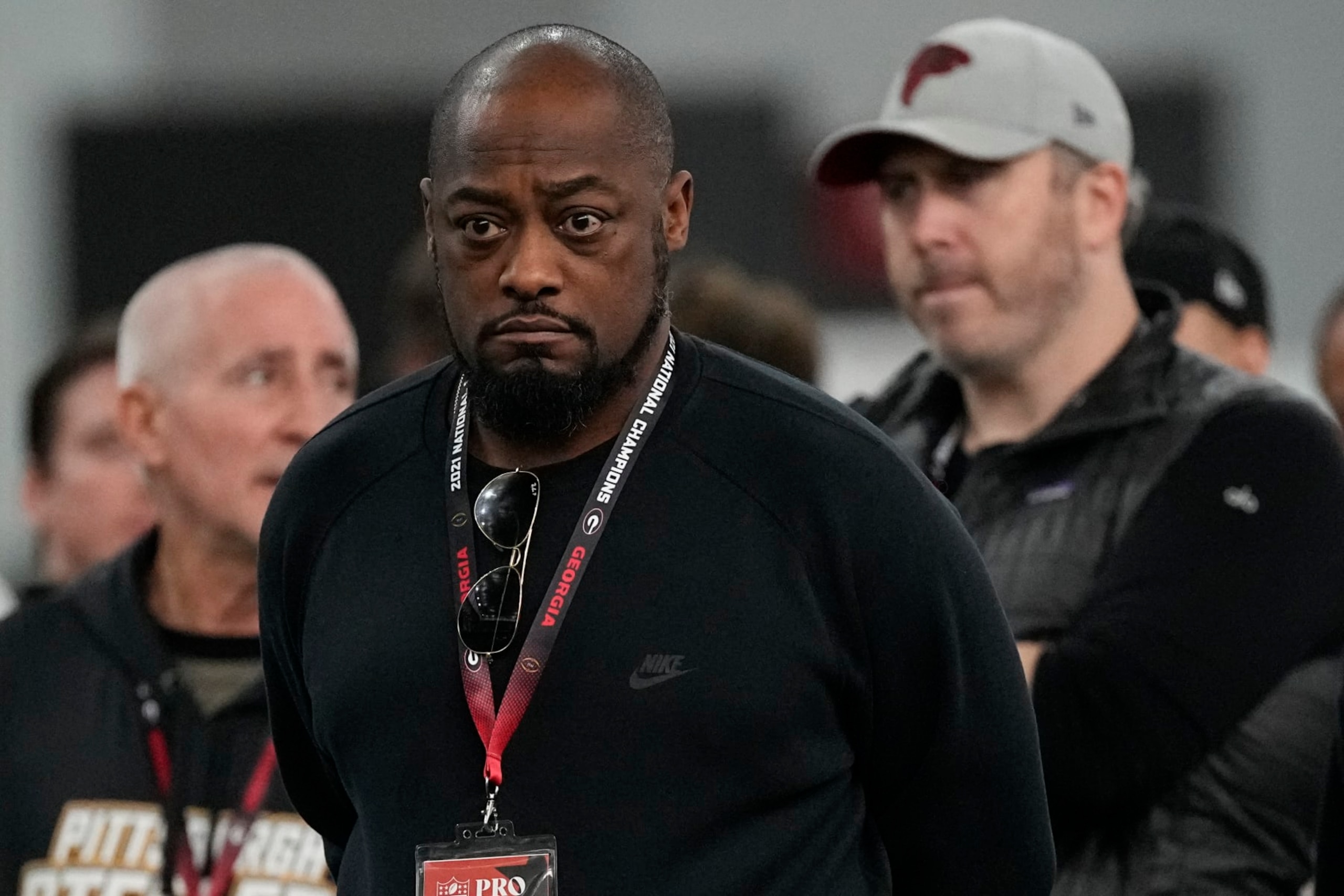 Pittsburgh Steelers head coach Mike Tomlin, center, and Falcons head coach Arthur Smith, right, watch football drills during Georgia's Pro Day, Wednesday, March 15, 2023, in Athens, Ga. (AP Photo/John Bazemore) Pittsburgh Steelers head coach Mike Tomlin, center, and Falcons head coach Arthur Smith, right, watch football drills during Georgia's Pro Day, Wednesday, March 15, 2023, in Athens, Ga. (AP Photo/John Bazemore)
