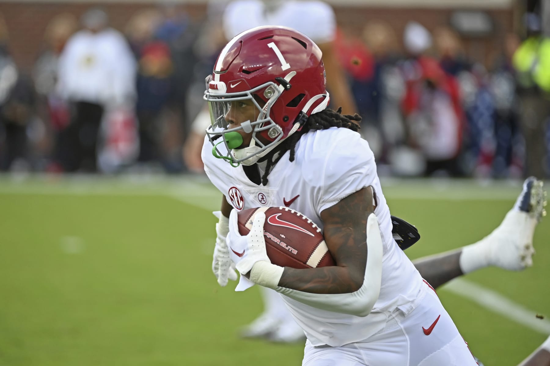 Alabama running back Jahmyr Gibbs (1) runs the ball during the first half of an NCAA college football game against Mississippi in Oxford, Miss., Saturday, Nov. 12, 2022. (AP Photo/Thomas Graning)