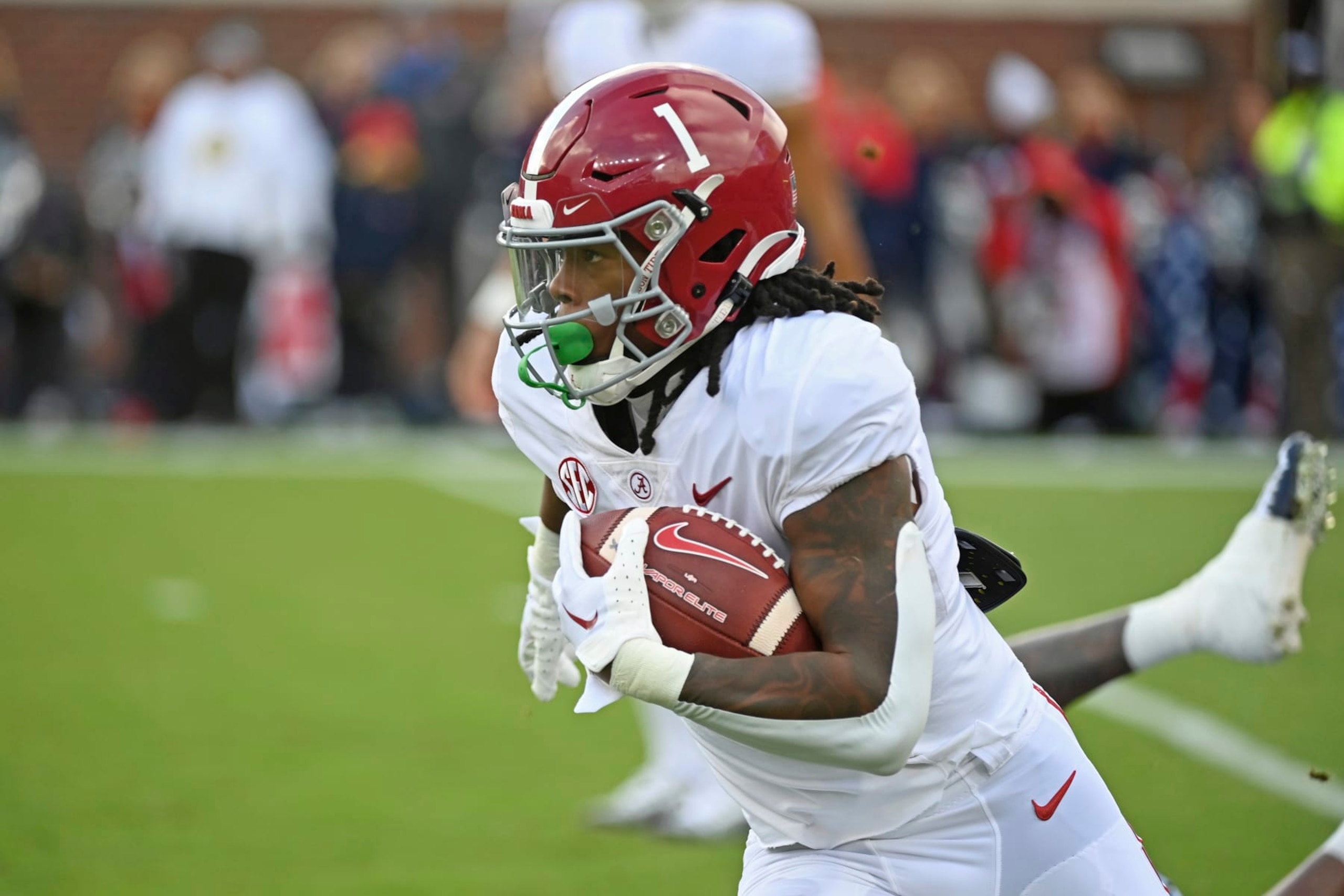 Alabama running back Jahmyr Gibbs (1) runs the ball during the first half of an NCAA college football game against Mississippi in Oxford, Miss., Saturday, Nov. 12, 2022. (AP Photo/Thomas Graning)
