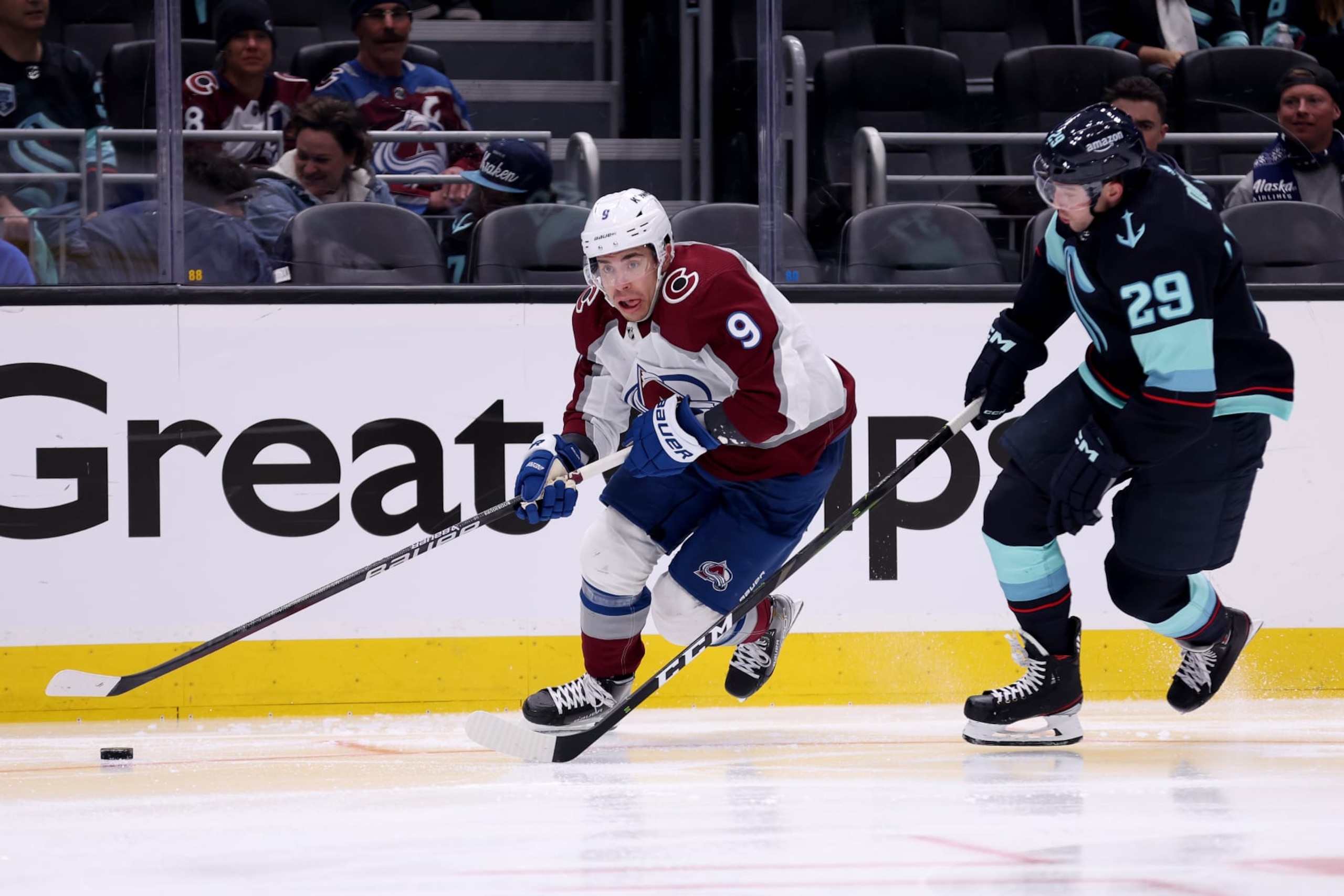 SEATTLE, WASHINGTON - APRIL 22: Evan Rodrigues #9 of the Colorado Avalanche skates against Vince Dunn #29 of the Seattle Kraken during the third period in Game Three of the First Round of the 2023 Stanley Cup Playoffs at Climate Pledge Arena on April 22, 2023 in Seattle, Washington. (Photo by Steph Chambers/Getty Images)