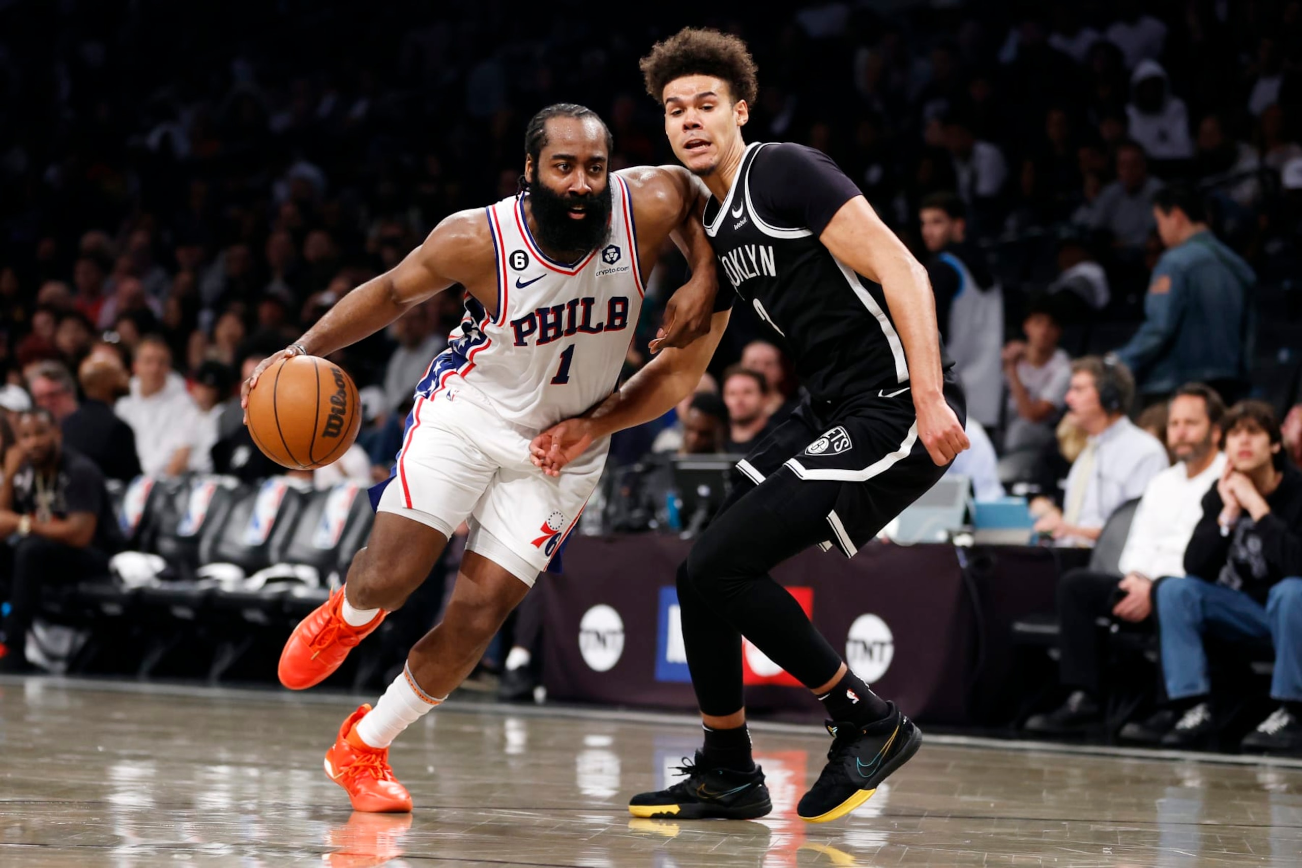 NEW YORK, NEW YORK - APRIL 22: James Harden #1 of the Philadelphia 76ers dribbles against Cameron Johnson #2 of the Brooklyn Nets during the second half of Game Four of the Eastern Conference First Round Playoffs at Barclays Center on April 22, 2023 in the Brooklyn borough of New York City. The 76ers won 96-88. NOTE TO USER: User expressly acknowledges and agrees that, by downloading and or using this photograph, User is consenting to the terms and conditions of the Getty Images License Agreement. (Photo by Sarah Stier/Getty Images)