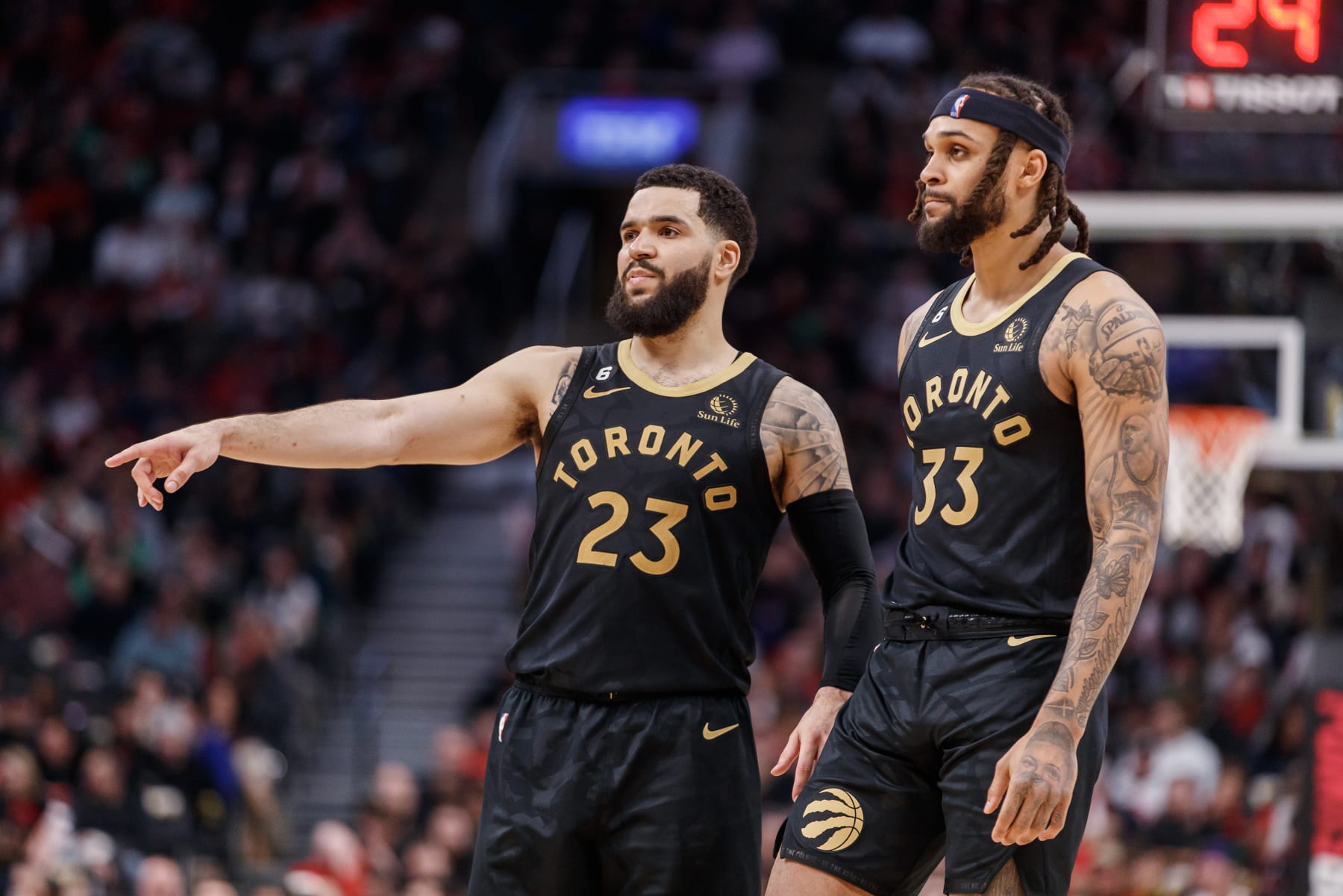TORONTO, ON - MARCH 18: Fred VanVleet #23 of the Toronto Raptors talks with Gary Trent Jr. #33 during second half of their NBA game against the Minnesota Timberwolves at Scotiabank Arena on March 18, 2023 in Toronto, Canada. NOTE TO USER: User expressly acknowledges and agrees that, by downloading and or using this photograph, User is consenting to the terms and conditions of the Getty Images License Agreement. (Photo by Cole Burston/Getty Images)