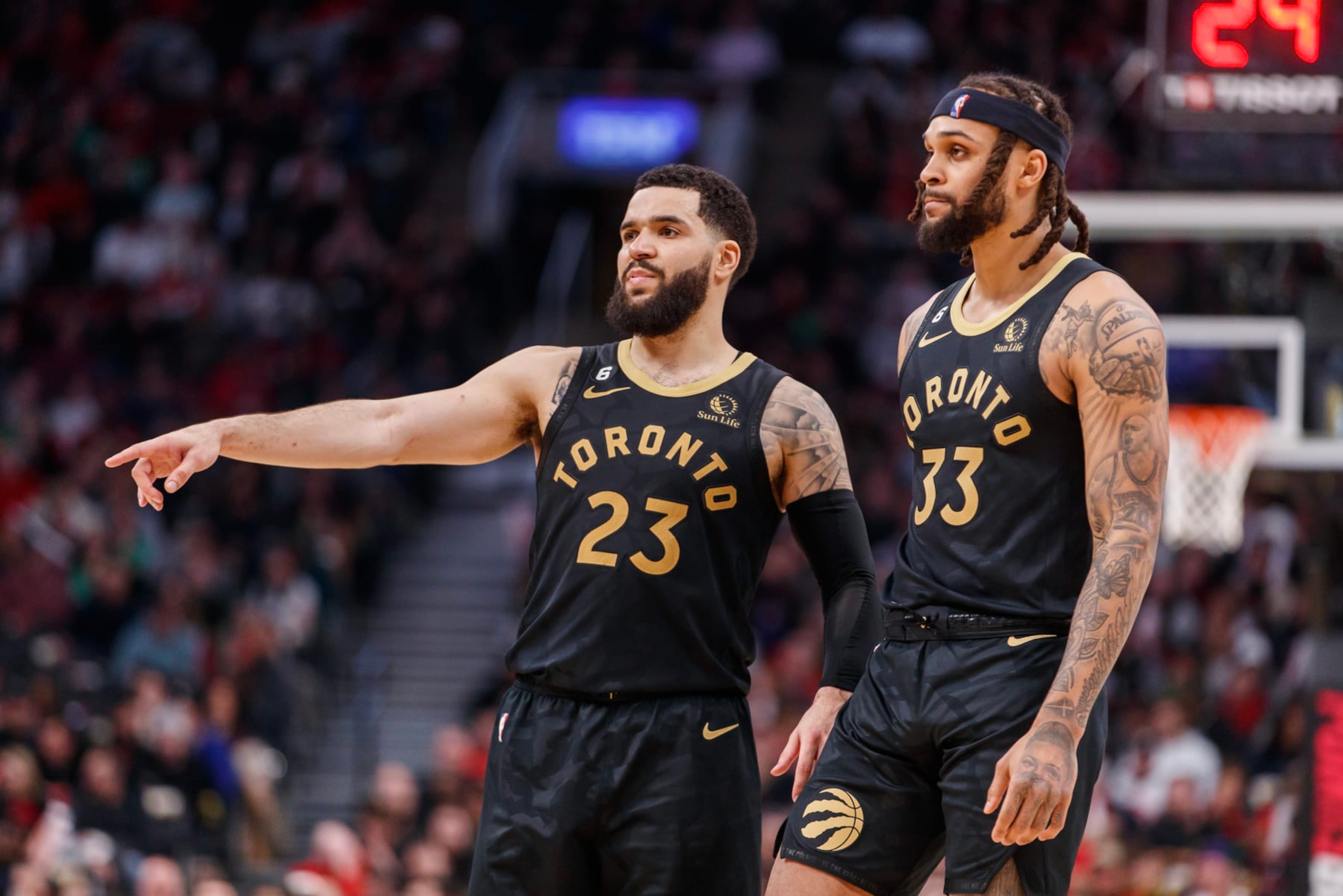 TORONTO, ON - MARCH 18: Fred VanVleet #23 of the Toronto Raptors talks with Gary Trent Jr. #33 during second half of their NBA game against the Minnesota Timberwolves at Scotiabank Arena on March 18, 2023 in Toronto, Canada. NOTE TO USER: User expressly acknowledges and agrees that, by downloading and or using this photograph, User is consenting to the terms and conditions of the Getty Images License Agreement. (Photo by Cole Burston/Getty Images)
