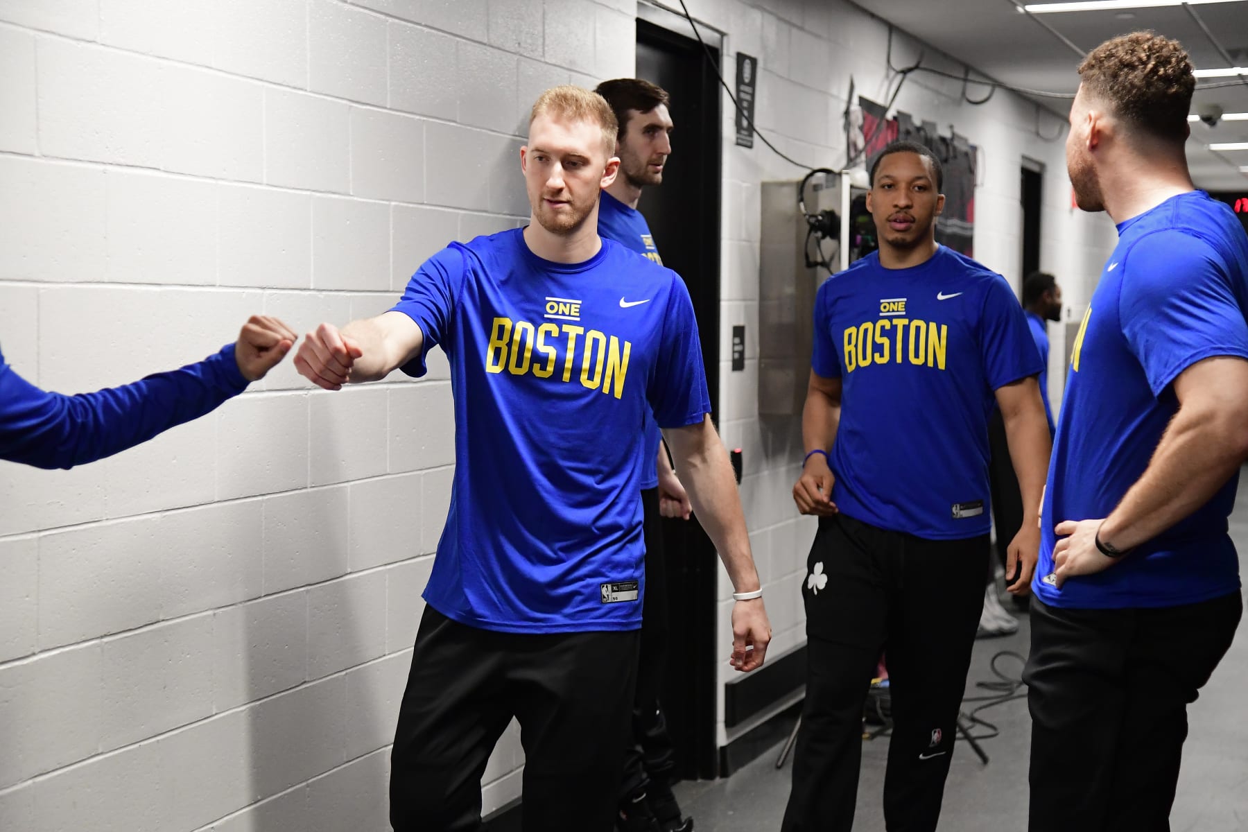 BOSTON, MA - APRIL 15: Sam Hauser #30 of the Boston Celtics high fives a teammate before the game During round one game one on April 15, 2023 at the TD Garden in Boston, Massachusetts. NOTE TO USER: User expressly acknowledges and agrees that, by downloading and or using this photograph, User is consenting to the terms and conditions of the Getty Images License Agreement. Mandatory Copyright Notice: Copyright 2023 NBAE  (Photo by Brian Babineau/NBAE via Getty Images)