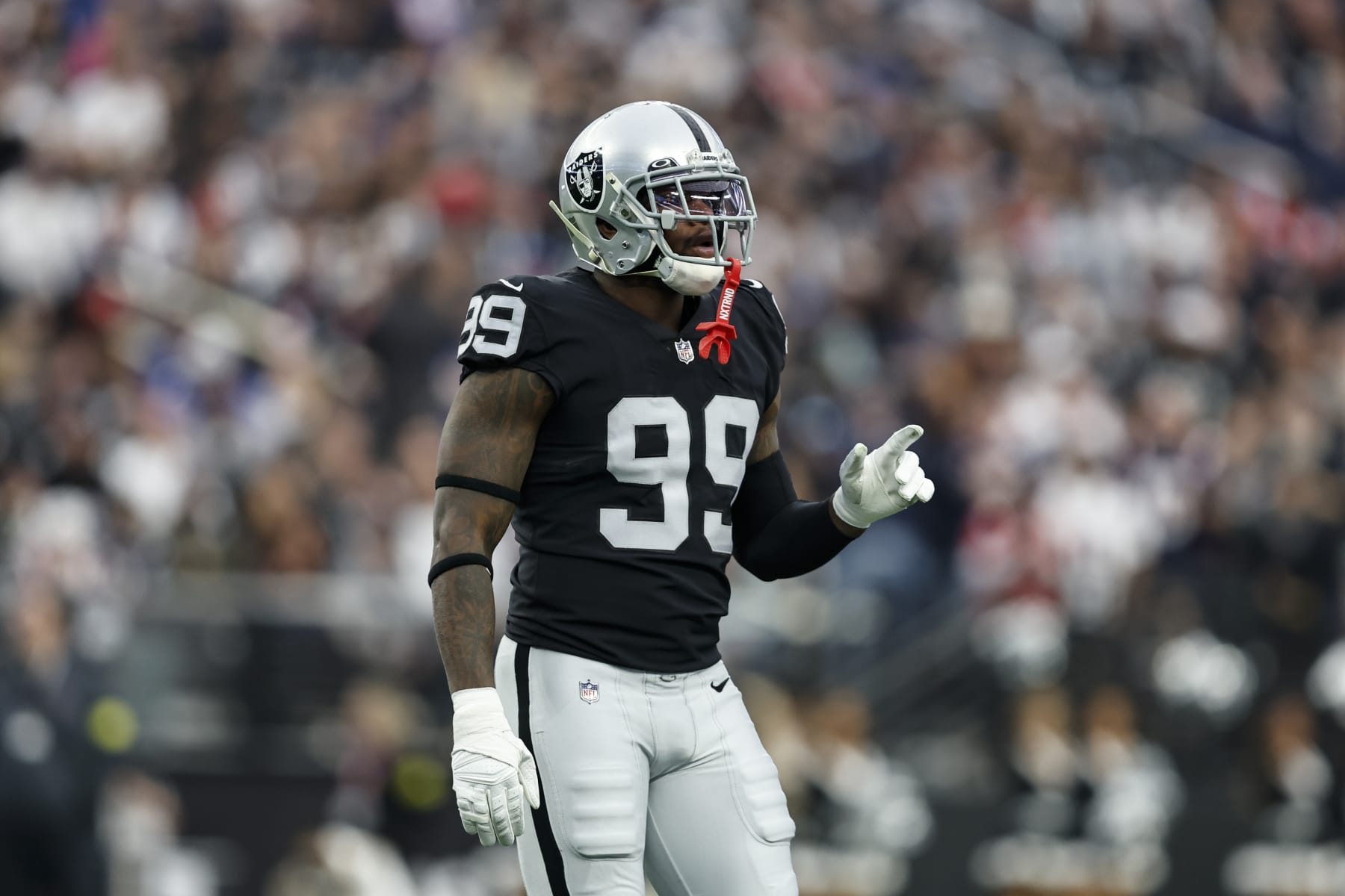 LAS VEGAS, NEVADA - DECEMBER 18: Clelin Ferrell #99 of the Las Vegas Raiders reacts during an NFL football game between the Las Vegas Raiders and the New England Patriots at Allegiant Stadium on December 18, 2022 in Las Vegas, Nevada. (Photo by Michael Owens/Getty Images)