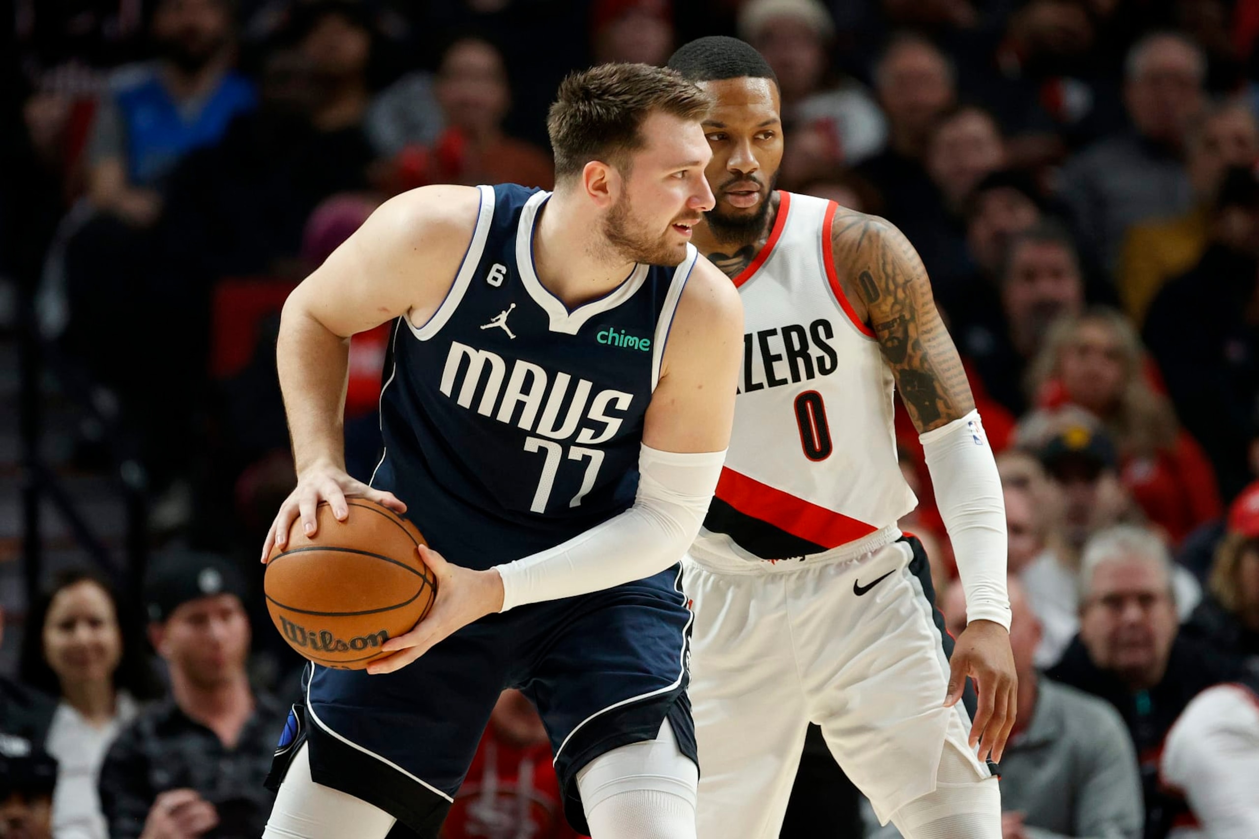 Luka DonÄiÄ (left) and Damian Lillard (right)
