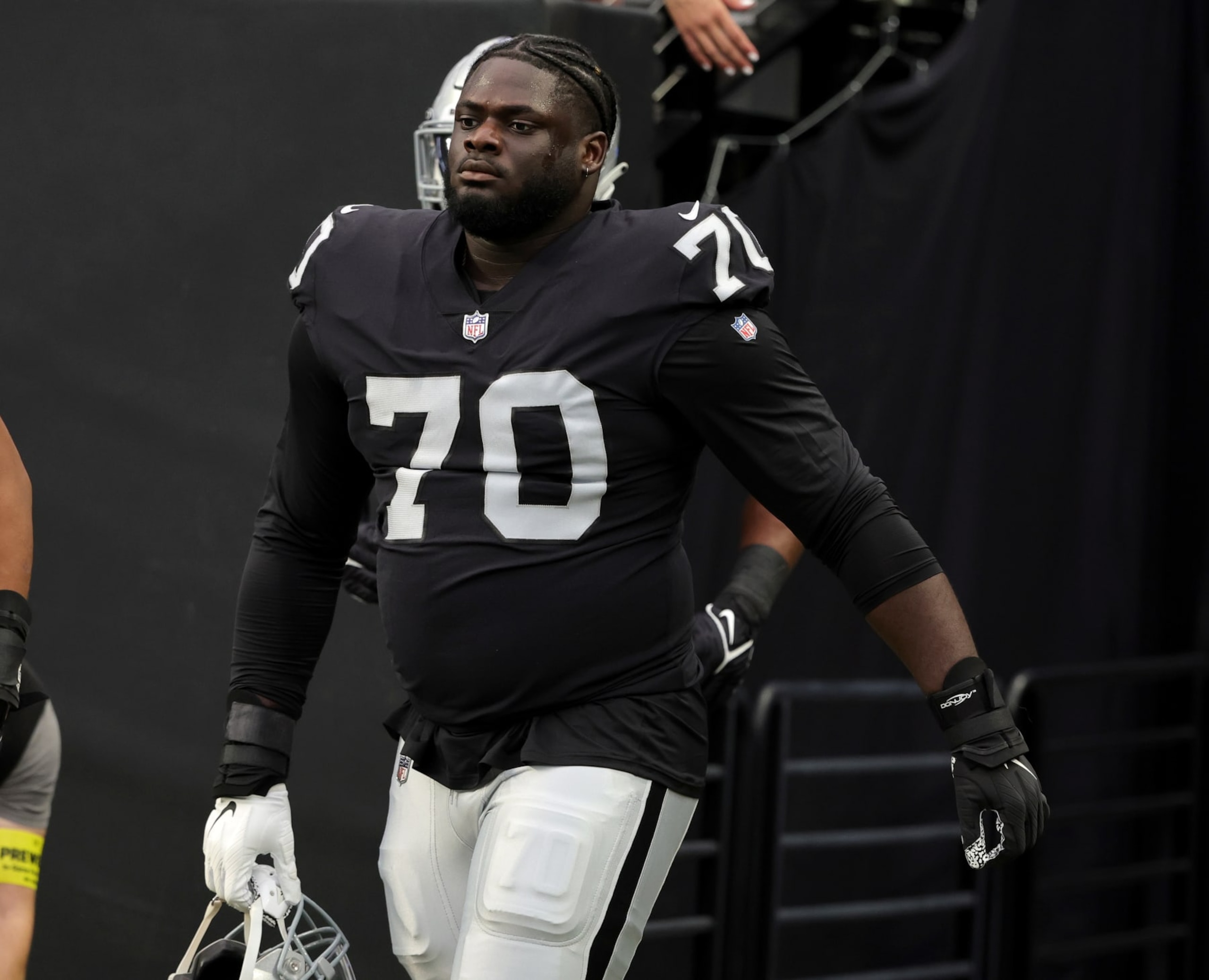 LAS VEGAS, NEVADA - AUGUST 14: Offensive tackle Alex Leatherwood #70 of the Las Vegas Raiders takes the field for warmups before a game against the Minnesota Vikings at Allegiant Stadium on August 14, 2022 in Las Vegas, Nevada. The Raiders defeated Vikings the 26-20. (Photo by Ethan Miller/Getty Images)