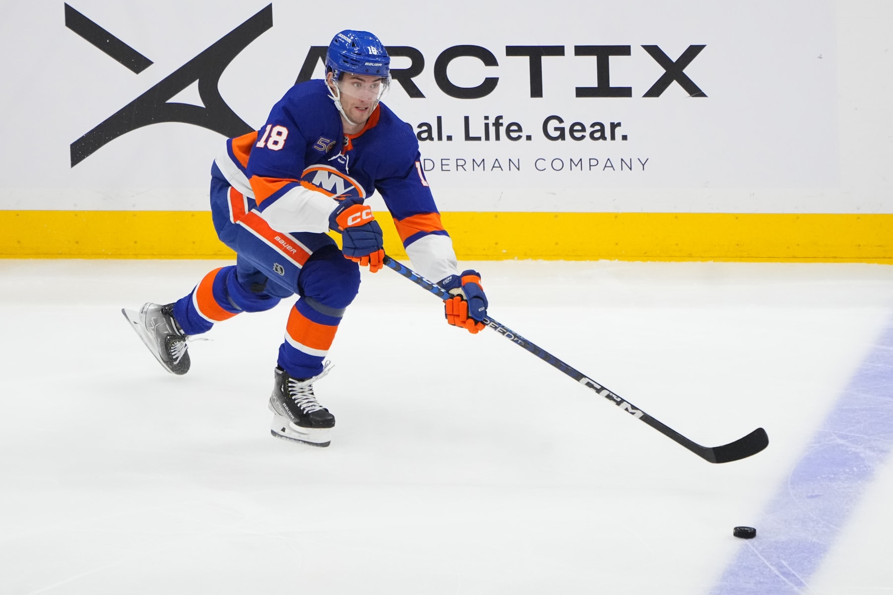 ELMONT, NY - APRIL 21: New York Islanders Left Wing Pierre Engvall (18) skates with the puck during the second period  of Game 3 of the National Hockey League Eastern Conference First Round Playoff game between the Carolina Hurricanes and New York Islanders on April 21, 2023, at UBS Arena in Elmont, NY.  (Photo by Gregory Fisher/Icon Sportswire via Getty Images)