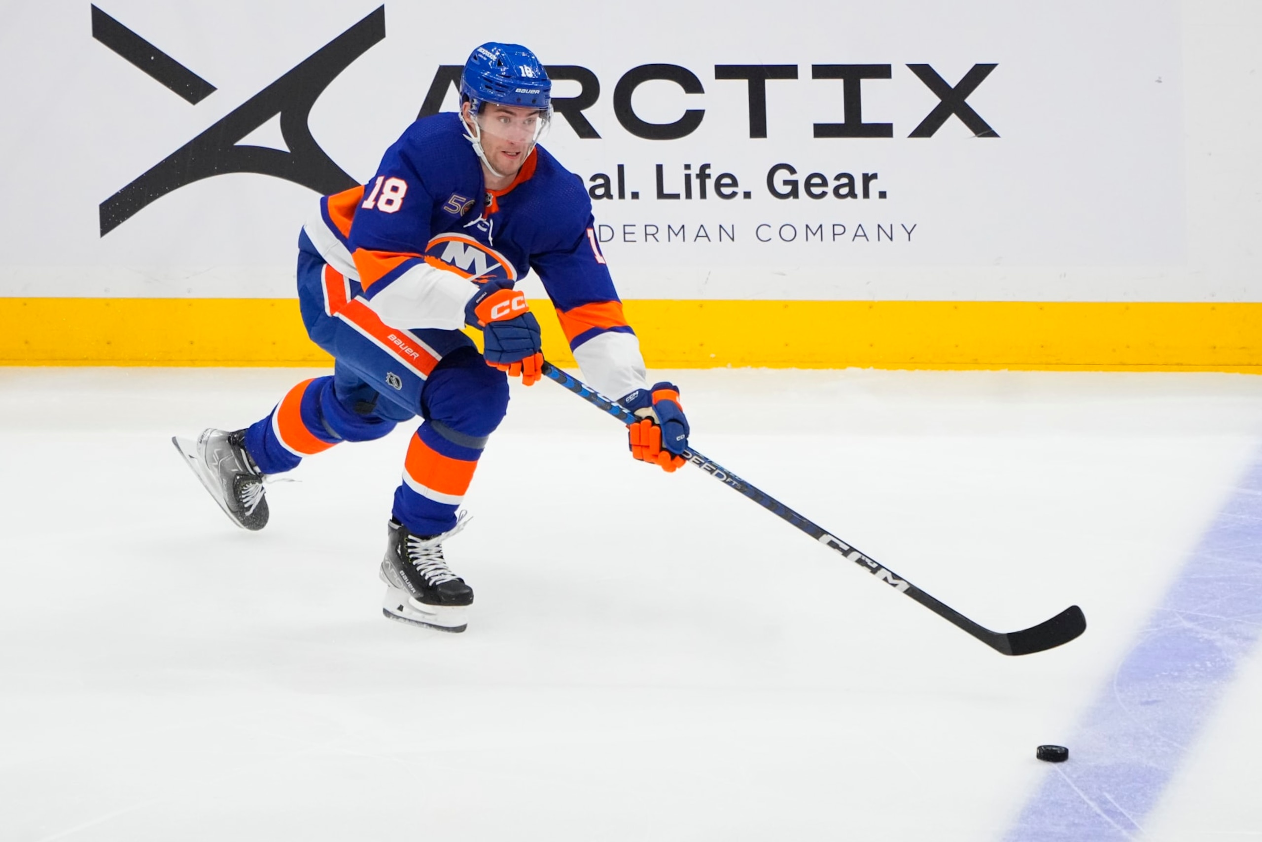ELMONT, NY - APRIL 21: New York Islanders Left Wing Pierre Engvall (18) skates with the puck during the second period  of Game 3 of the National Hockey League Eastern Conference First Round Playoff game between the Carolina Hurricanes and New York Islanders on April 21, 2023, at UBS Arena in Elmont, NY.  (Photo by Gregory Fisher/Icon Sportswire via Getty Images)