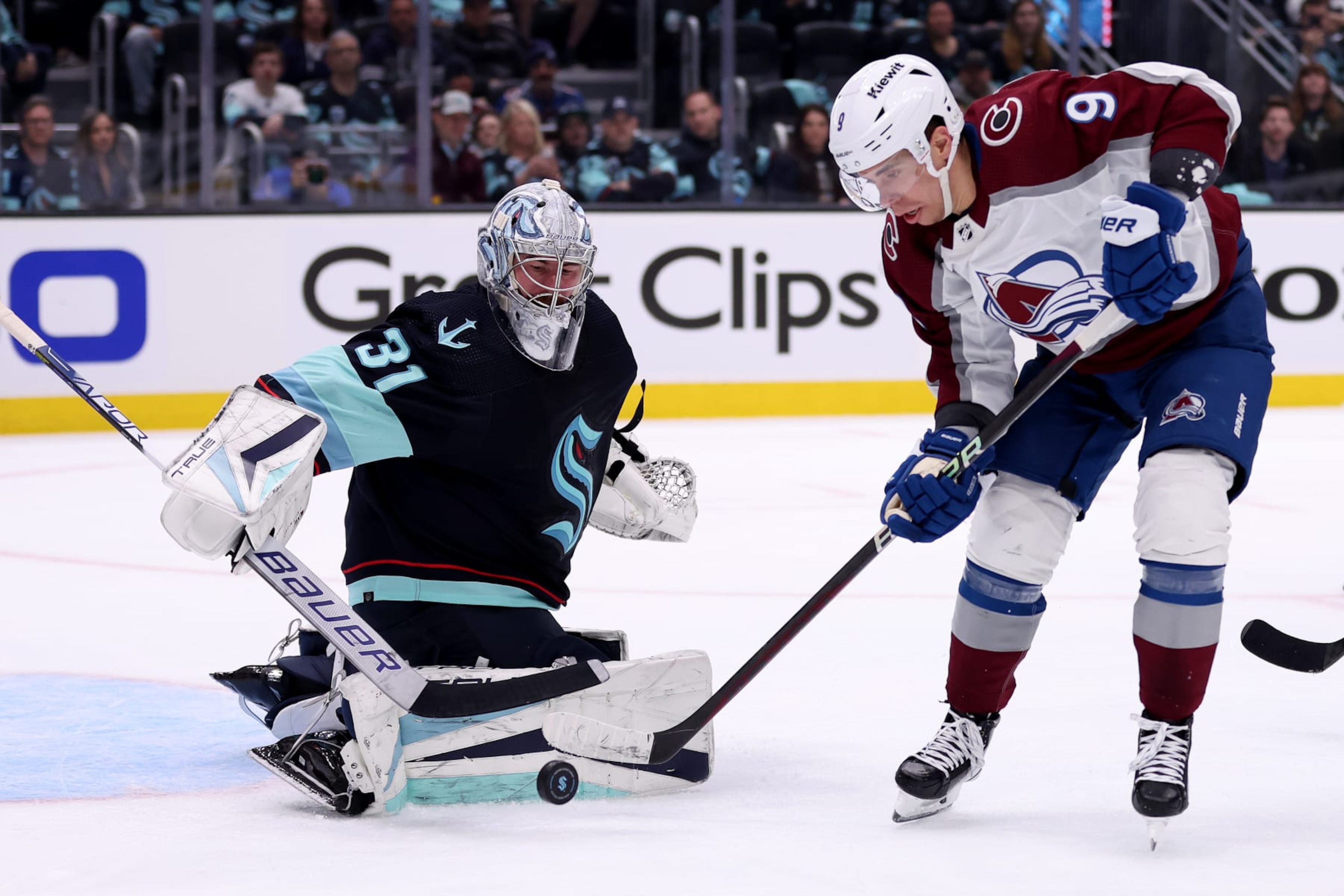 SEATTLE, WASHINGTON - APRIL 22: Evan Rodrigues #9 of the Colorado Avalanche misses an opportunity against Philipp Grubauer #31 of the Seattle Kraken during the first period in Game Three of the First Round of the 2023 Stanley Cup Playoffs at Climate Pledge Arena on April 22, 2023 in Seattle, Washington. (Photo by Steph Chambers/Getty Images) SEATTLE, WASHINGTON - APRIL 22: Evan Rodrigues #9 of the Colorado Avalanche misses an opportunity against Philipp Grubauer #31 of the Seattle Kraken during the first period in Game Three of the First Round of the 2023 Stanley Cup Playoffs at Climate Pledge Arena on April 22, 2023 in Seattle, Washington. (Photo by Steph Chambers/Getty Images)