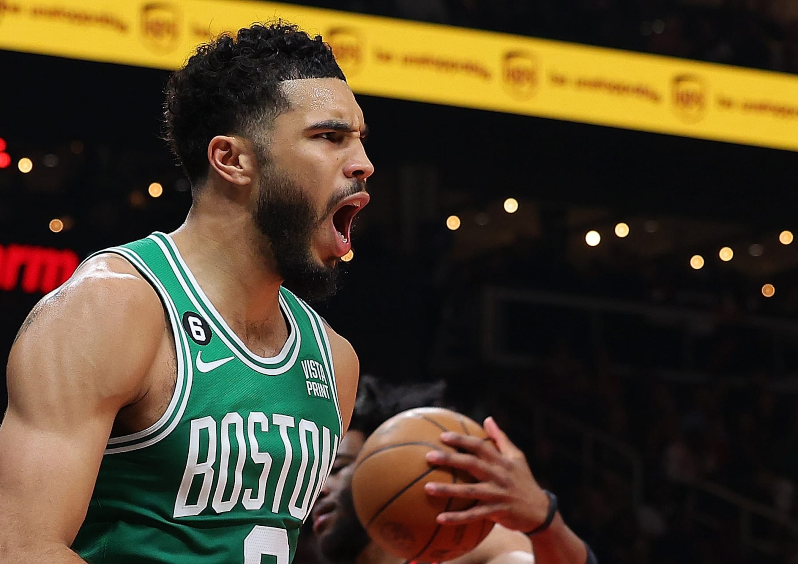 ATLANTA, GEORGIA - APRIL 23: Jayson Tatum #0 of the Boston Celtics reacts after scoring a basket against Saddiq Bey #41 and Onyeka Okongwu #17 of the Atlanta Hawks during the first quarter of Game Four of the Eastern Conference First Round Playoffs at State Farm Arena on April 23, 2023 in Atlanta, Georgia. NOTE TO USER: User expressly acknowledges and agrees that, by downloading and or using this photograph, User is consenting to the terms and conditions of the Getty Images License Agreement. (Photo by Kevin C. Cox/Getty Images) ATLANTA, GEORGIA - APRIL 23: Jayson Tatum #0 of the Boston Celtics reacts after scoring a basket against Saddiq Bey #41 and Onyeka Okongwu #17 of the Atlanta Hawks during the first quarter of Game Four of the Eastern Conference First Round Playoffs at State Farm Arena on April 23, 2023 in Atlanta, Georgia. NOTE TO USER: User expressly acknowledges and agrees that, by downloading and or using this photograph, User is consenting to the terms and conditions of the Getty Images License Agreement. (Photo by Kevin C. Cox/Getty Images)