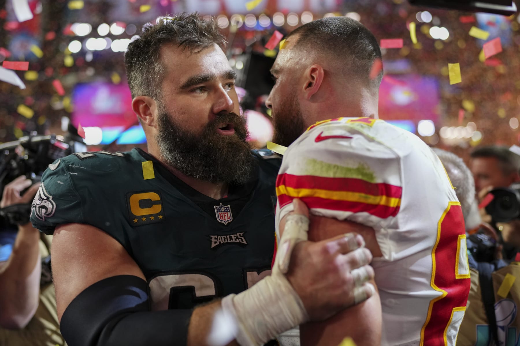 GLENDALE, AZ - FEBRUARY 12: Jason Kelce #62 of the Philadelphia Eagles speaks with Travis Kelce #87 of the Kansas City Chiefs after Super Bowl LVII at State Farm Stadium on February 12, 2023 in Glendale, Arizona. The Chiefs defeated the Eagles 38-35. (Photo by Cooper Neill/Getty Images)