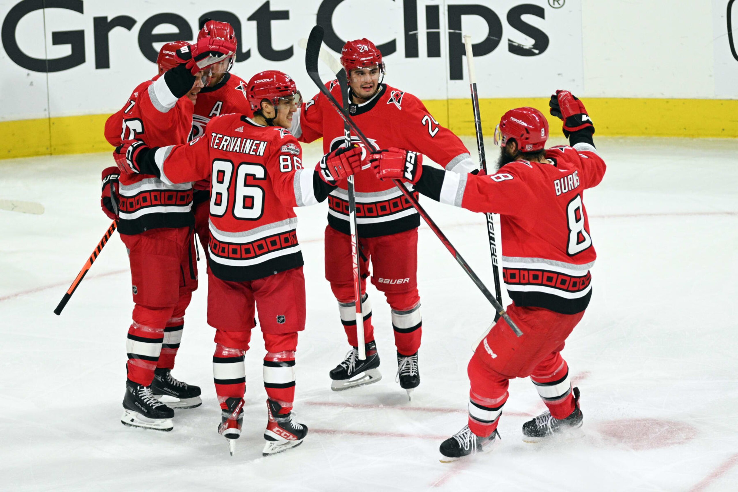 RALEIGH, NC - APRIL 19: Members of the Carolina Hurricanes celebrate scoring a goal during game 2 of the first round of the Stanley Cup Playoffs between the New York Islanders and the Carolina Hurricanes on April 19, 2023 at PNC Arena in Raleigh, North Carolina. (Photo by Katherine Gawlik/Icon Sportswire via Getty Images)