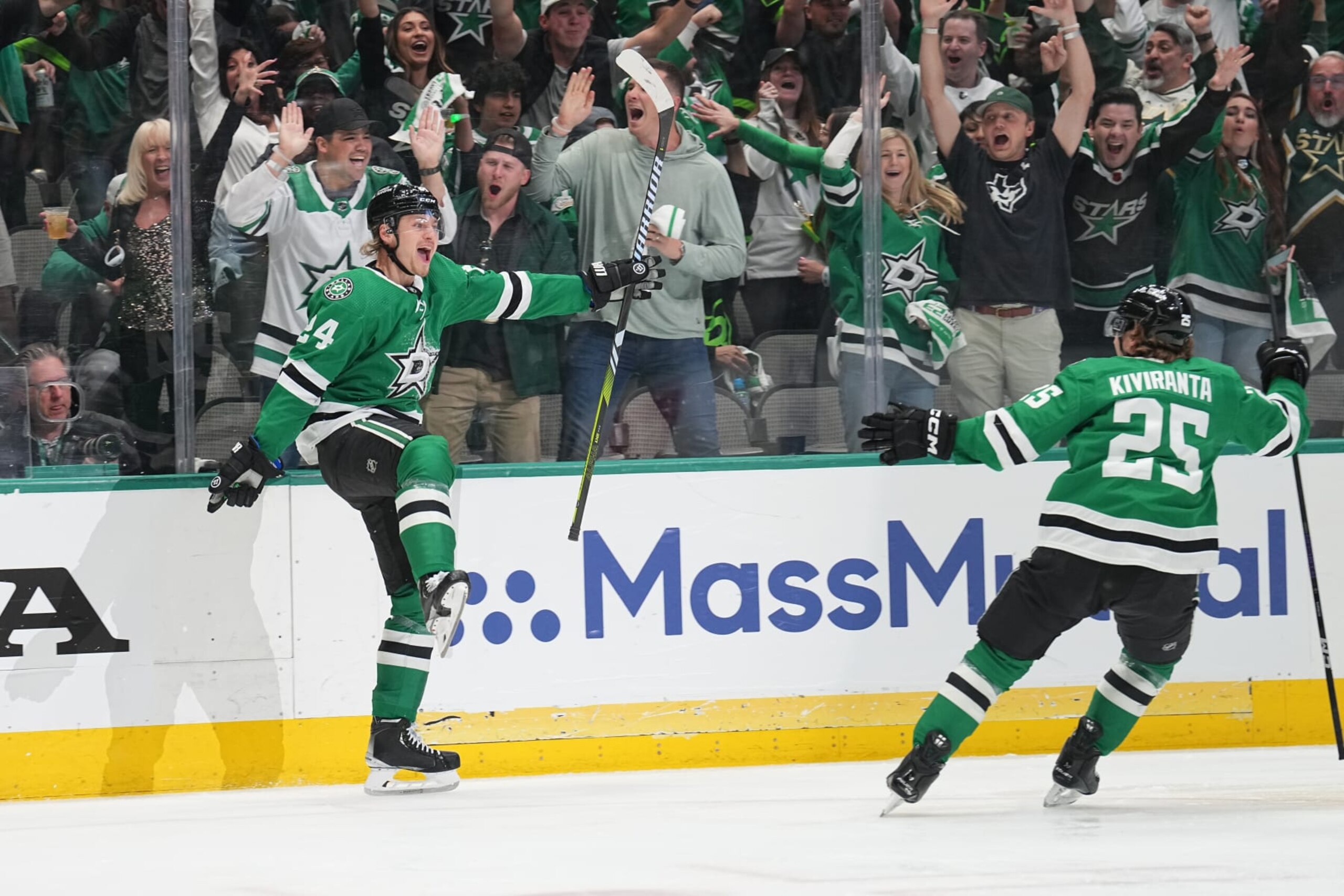 DALLAS, TX  APRIL 19: Joel Kiviranta #25 and Roope Hintz #24 of the Dallas Stars celebrate a goal against the Minnesota Wild in Game Two of the First Round of the 2023 Stanley Cup Playoffs at American Airlines Center on April 19, 2023, in Dallas, Texas (Photo by Glenn James/NHLI via Getty Images)