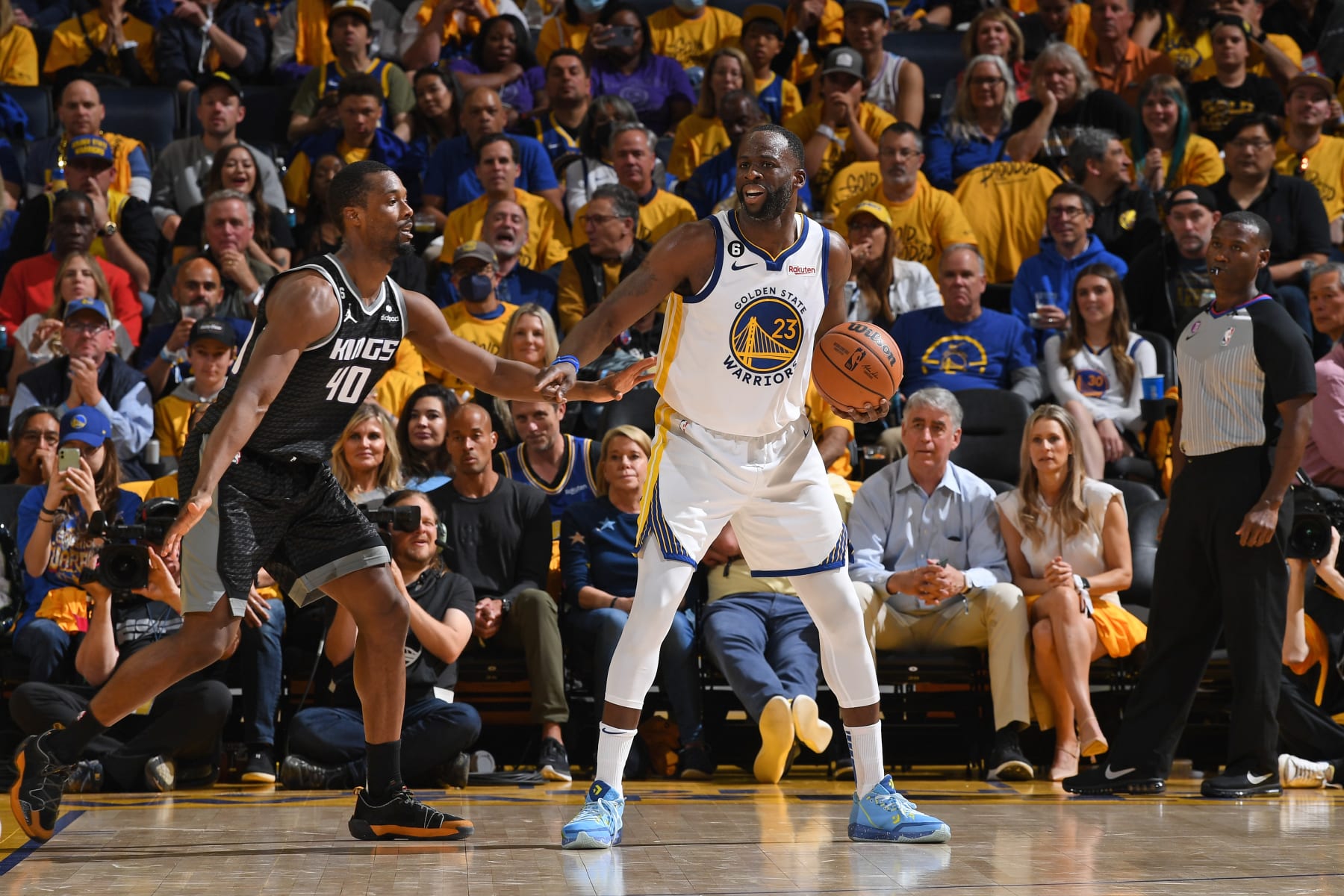 SAN FRANCISCO, CA - APRIL 23: Draymond Green #23 of the Golden State Warriors handles the ball during the game against the Sacramento Kings during Round One Game Four of the 2023 NBA Playoffs on April 23, 2023 at Chase Center in San Francisco, California. NOTE TO USER: User expressly acknowledges and agrees that, by downloading and or using this photograph, user is consenting to the terms and conditions of Getty Images License Agreement. Mandatory Copyright Notice: Copyright 2023 NBAE (Photo by Noah Graham/NBAE via Getty Images)