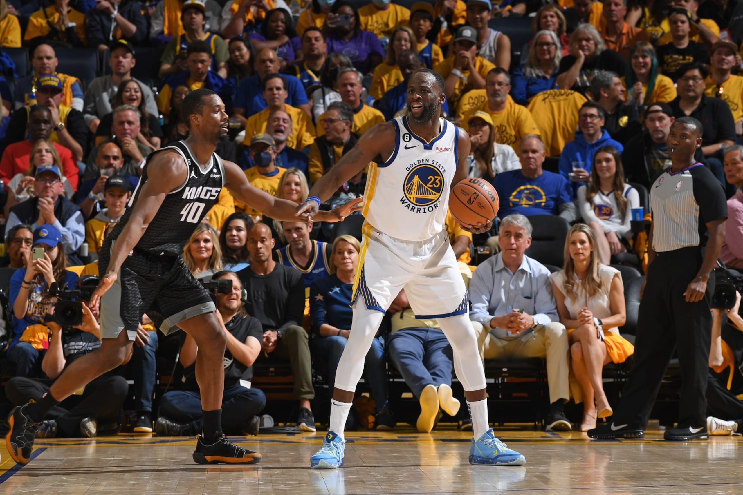 SAN FRANCISCO, CA - APRIL 23: Draymond Green #23 of the Golden State Warriors handles the ball during the game against the Sacramento Kings during Round One Game Four of the 2023 NBA Playoffs on April 23, 2023 at Chase Center in San Francisco, California. NOTE TO USER: User expressly acknowledges and agrees that, by downloading and or using this photograph, user is consenting to the terms and conditions of Getty Images License Agreement. Mandatory Copyright Notice: Copyright 2023 NBAE (Photo by Noah Graham/NBAE via Getty Images)
