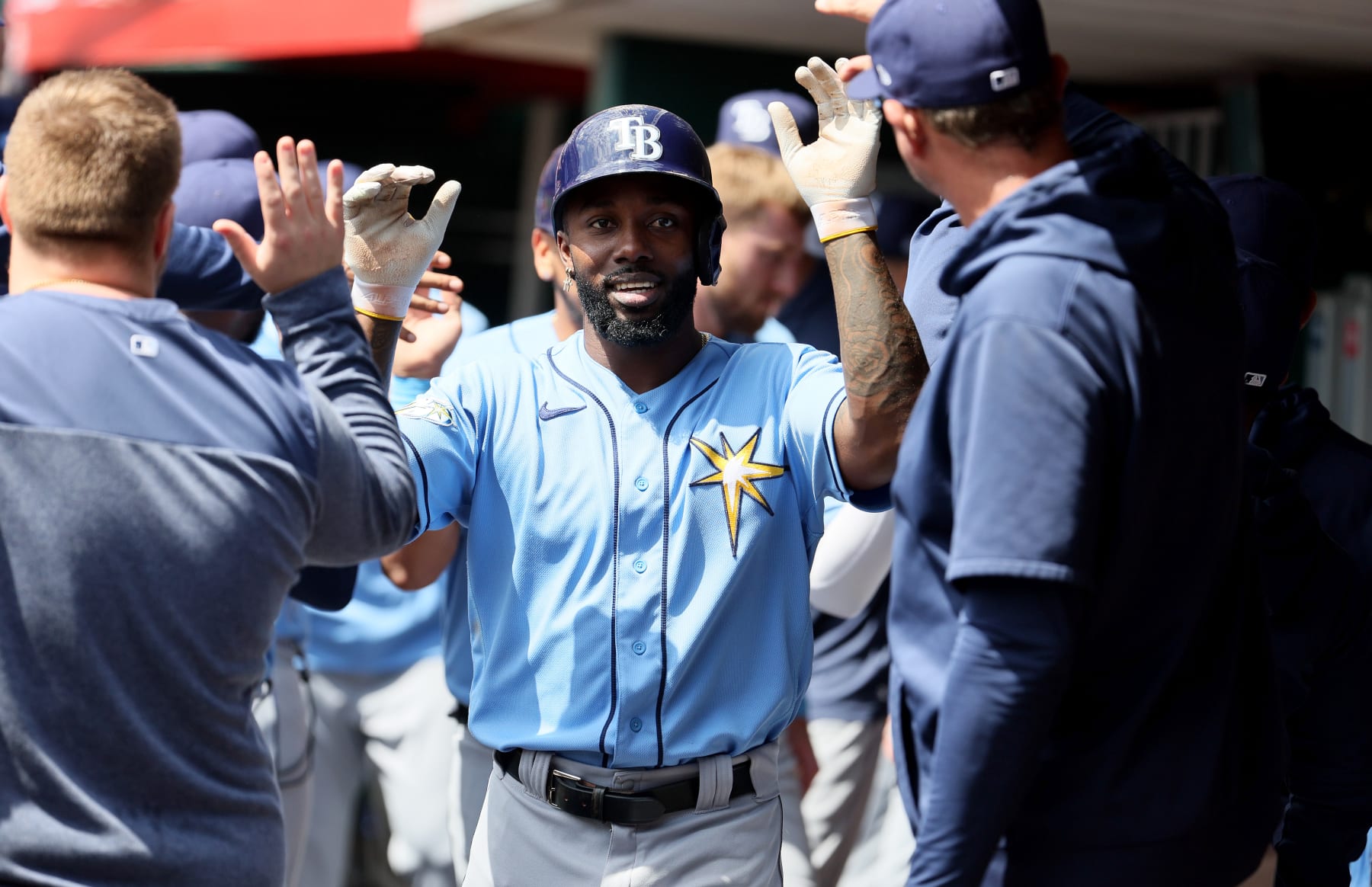 CINCINNATI, OHIO - APRIL 19: Randy Arozarena #56 of the Tampa Bay Rays celebrates with teammates after scoring in the first inning against the Cincinnati Reds at Great American Ball Park on April 19, 2023 in Cincinnati, Ohio. (Photo by Andy Lyons/Getty Images)