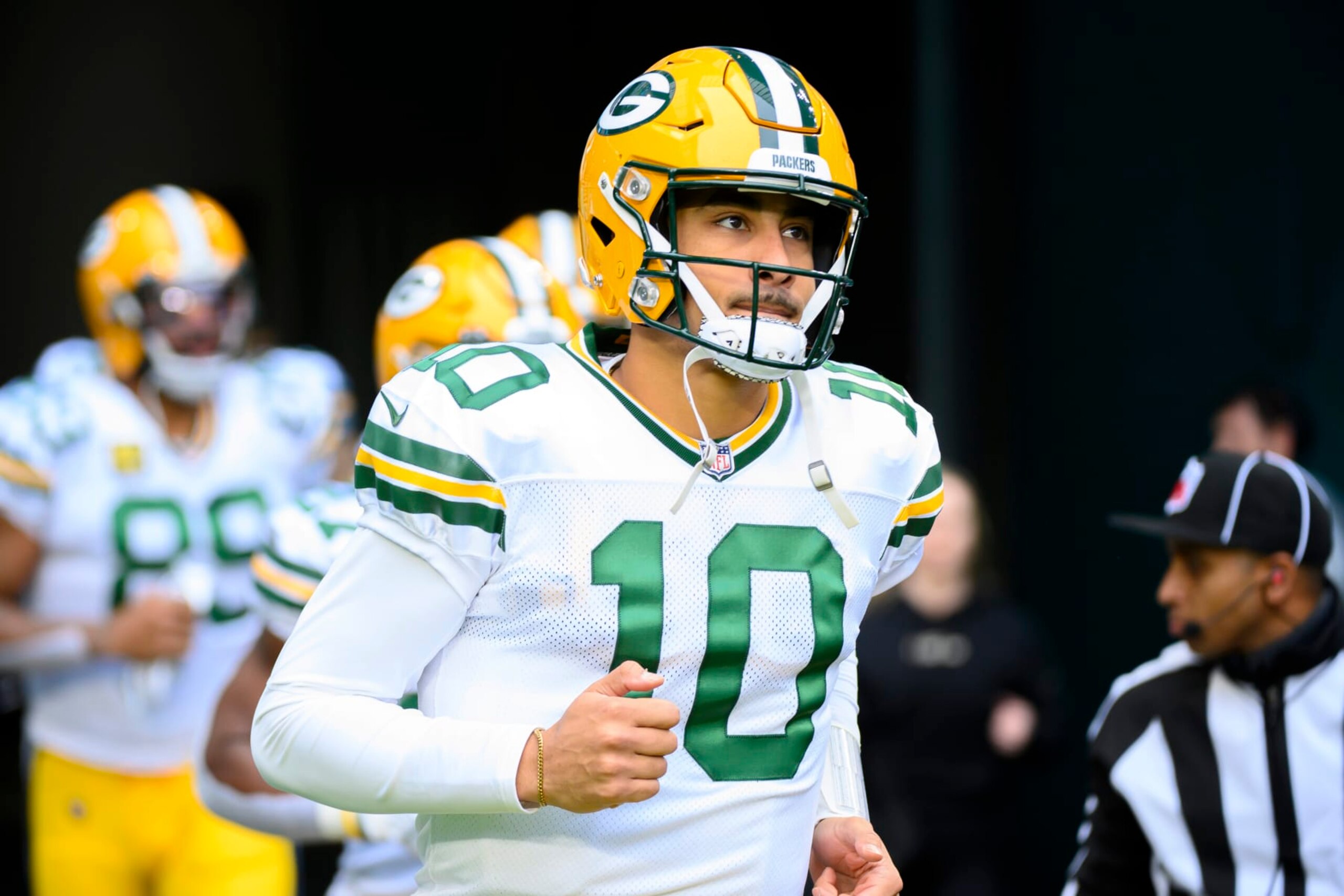 FILE - Green Bay Packers quarterback Jordan Love (10) runs onto the field before an NFL football game against the Miami Dolphins, Sunday, Dec. 25, 2022, in Miami Gardens, Fla. With Aaron Rodgers saying he intends to play for the New York Jets in the upcoming season, Love finally gets his chance to take over as a starting quarterback in his fourth NFL season.(AP Photo/Doug Murray, File) FILE - Green Bay Packers quarterback Jordan Love (10) runs onto the field before an NFL football game against the Miami Dolphins, Sunday, Dec. 25, 2022, in Miami Gardens, Fla. With Aaron Rodgers saying he intends to play for the New York Jets in the upcoming season, Love finally gets his chance to take over as a starting quarterback in his fourth NFL season.(AP Photo/Doug Murray, File)