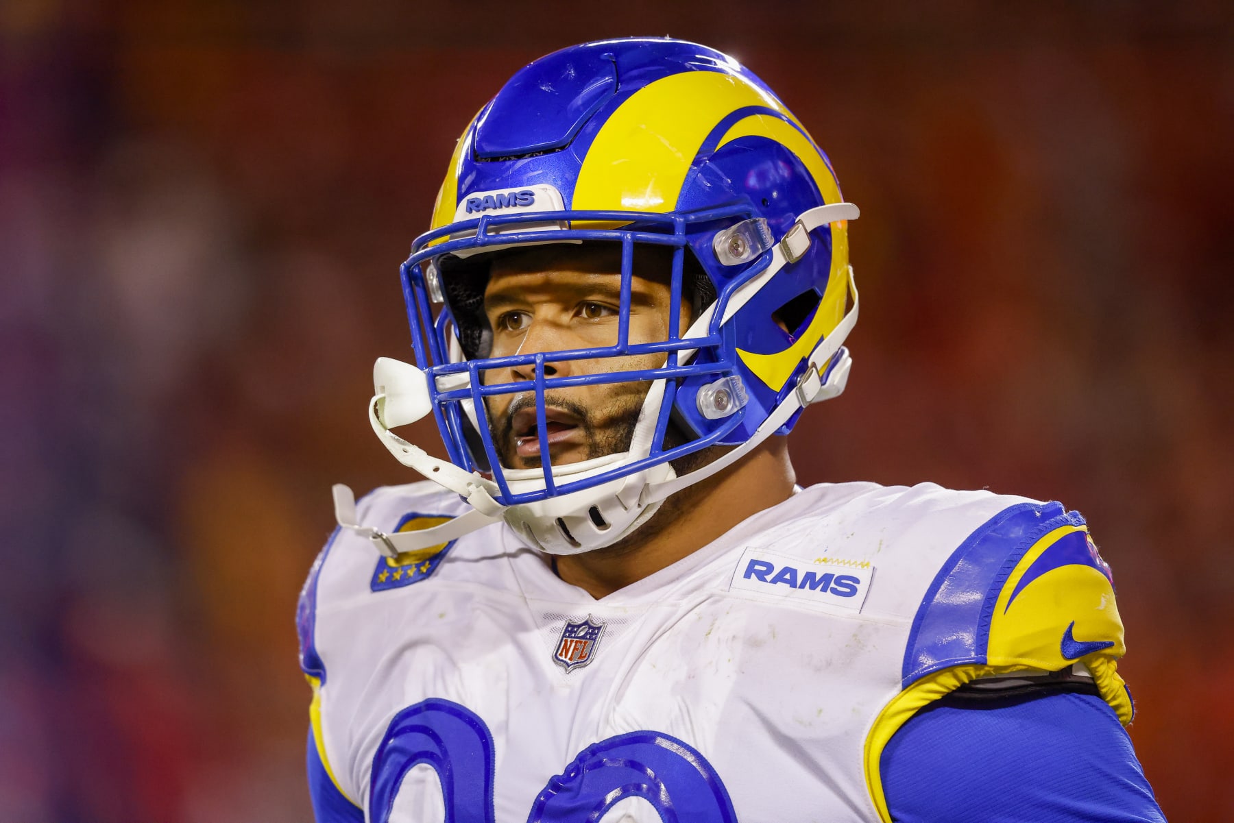 KANSAS CITY, MO - NOVEMBER 27: Aaron Donald #99 of the Los Angeles Rams walks off the field after a defensive interception in the fourth quarter against the Kansas City Chiefs at Arrowhead Stadium on November 27, 2022 in Kansas City, Missouri. (Photo by David Eulitt/Getty Images)
