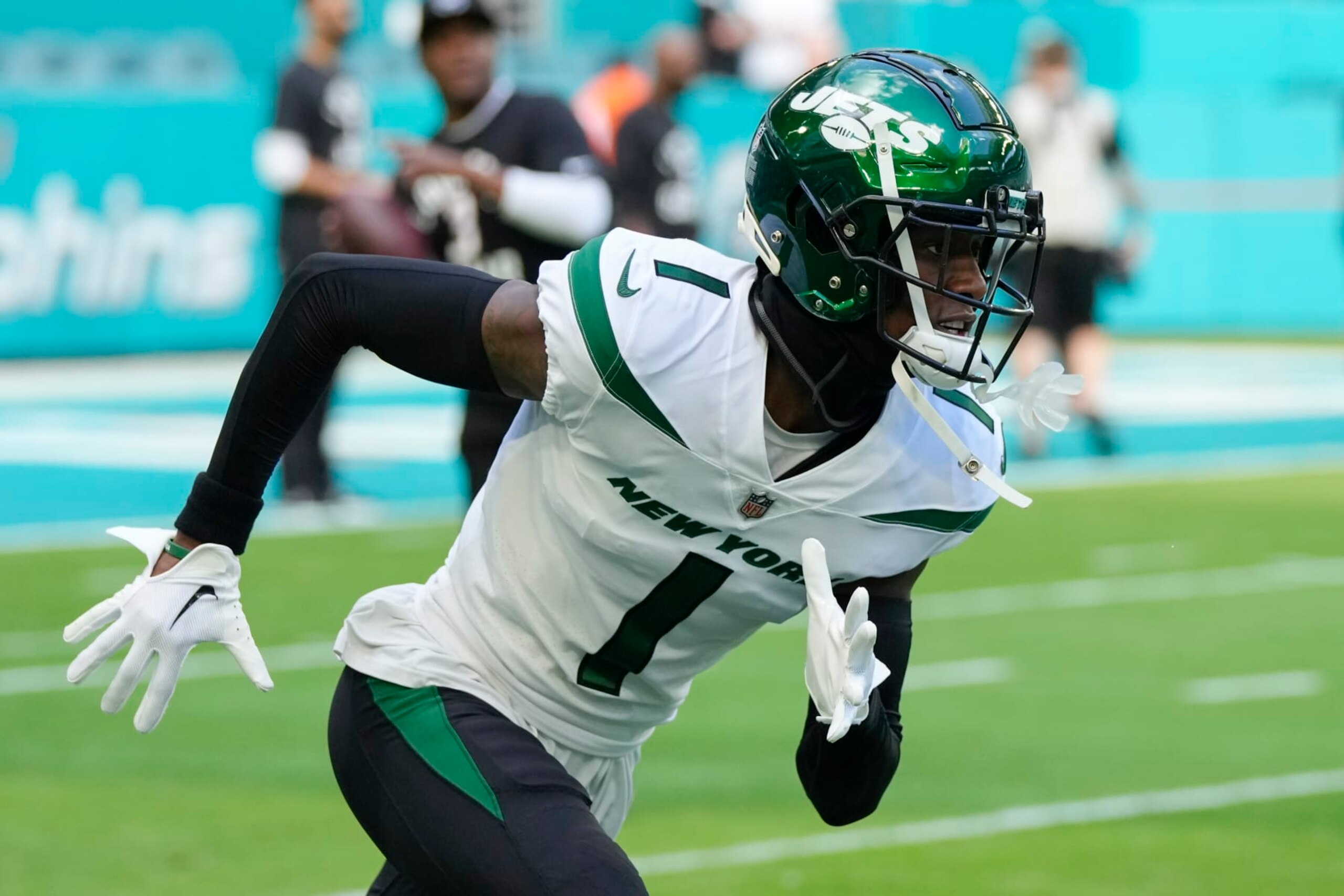 New York Jets cornerback Sauce Gardner (1) runs during a warm-up drill ahead of an NFL football game against the Miami Dolphins, Sunday, Jan. 8, 2023, in Miami Gardens, Fla. (AP Photo/Rebecca Blackwell) New York Jets cornerback Sauce Gardner (1) runs during a warm-up drill ahead of an NFL football game against the Miami Dolphins, Sunday, Jan. 8, 2023, in Miami Gardens, Fla. (AP Photo/Rebecca Blackwell)