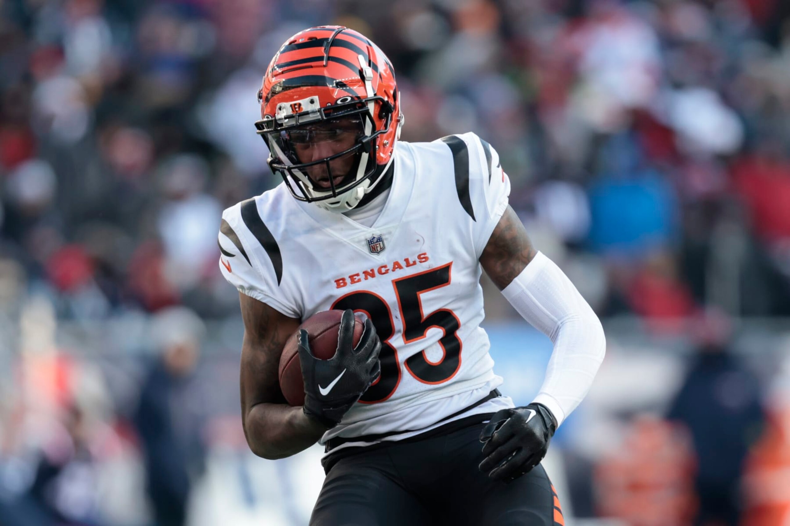 FOXBOROUGH, MASSACHUSETTS - DECEMBER 24: Tee Higgins #85 of the Cincinnati Bengals runs for yard after catch during the third quarter against the New England Patriots at Gillette Stadium on December 24, 2022 in Foxborough, Massachusetts. (Photo by Nick Grace/Getty Images)