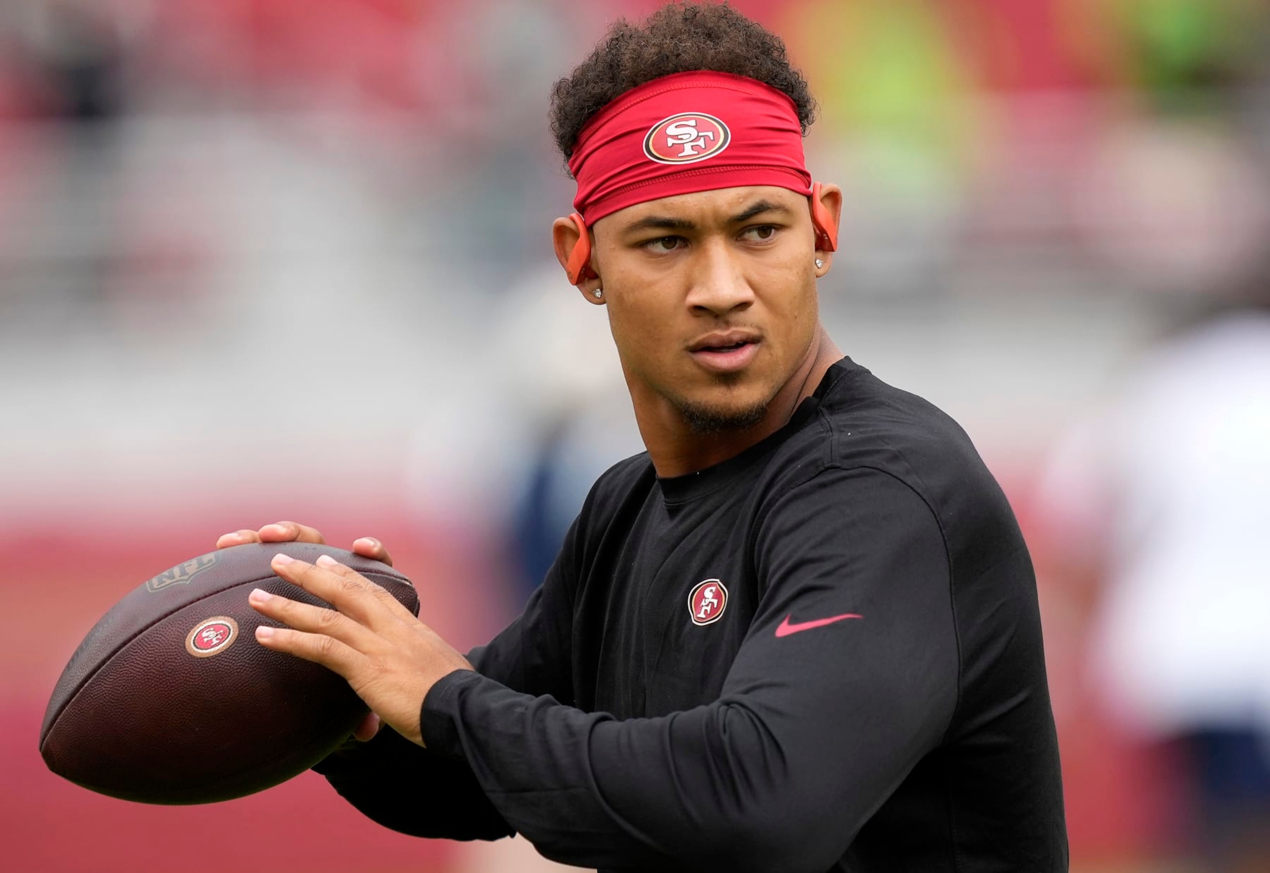 SANTA CLARA, CALIFORNIA - SEPTEMBER 18: Trey Lance #5 of the San Francisco 49ers warms up before the game against the Seattle Seahawks at Levi's Stadium on September 18, 2022 in Santa Clara, California. (Photo by Thearon W. Henderson/Getty Images)